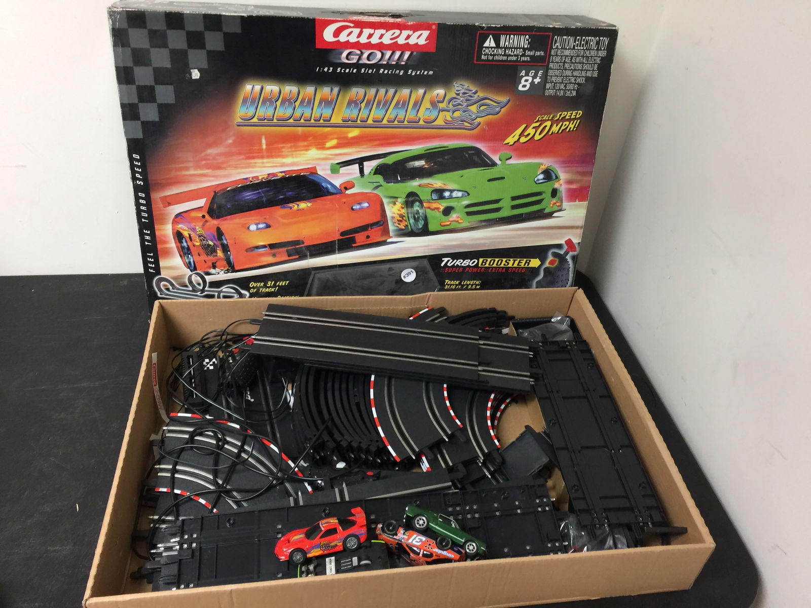 Carrera Go Slot Racing System: Box 28" x 20". Includes 4 cars.