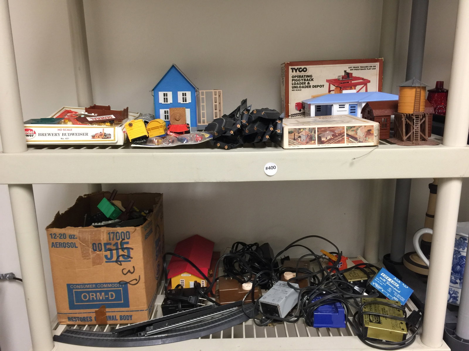 2 Shelves Train Accessories: Includes buildings, cars, transformers and more.