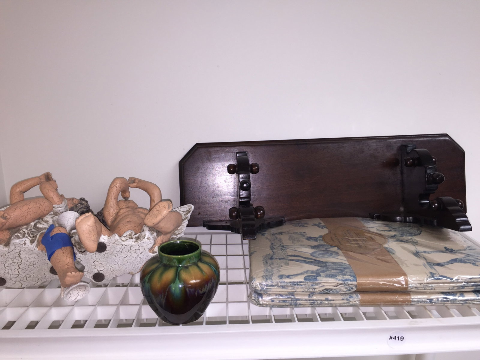 Decorative Lot: Includes shelf, curtain and decorative angels.