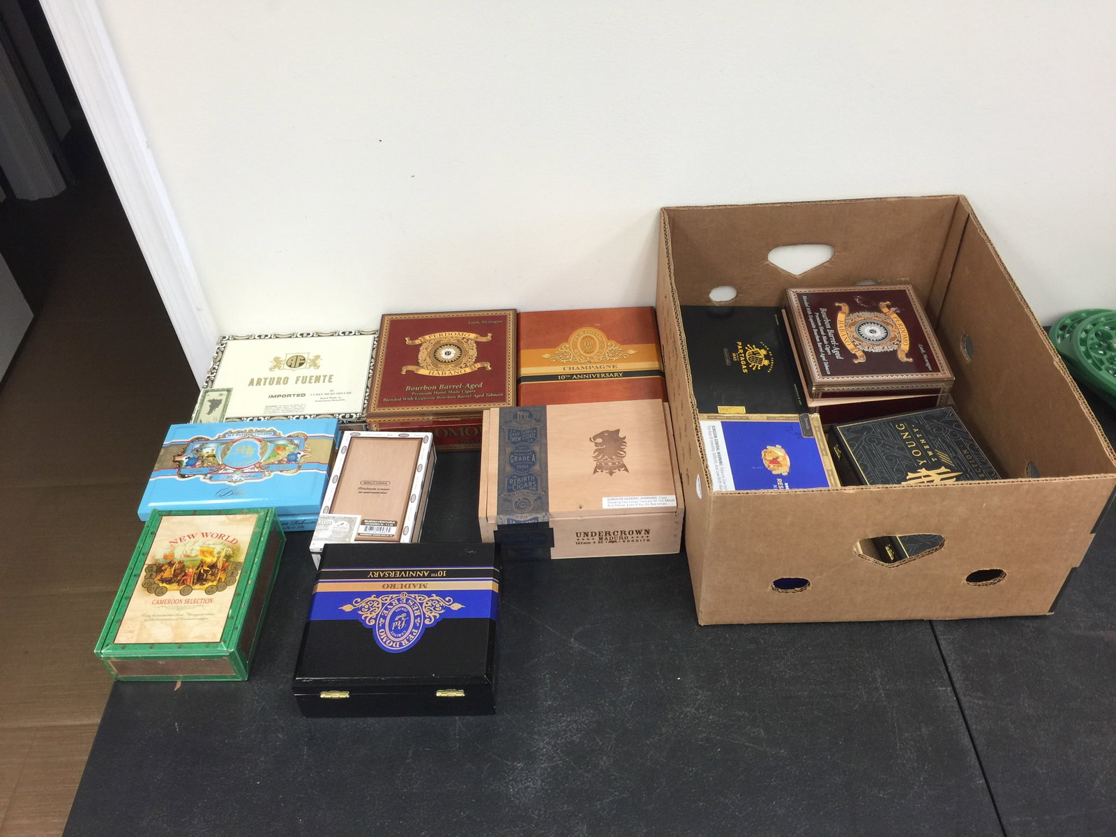 Assorted Cigar Boxes: various sizes.
