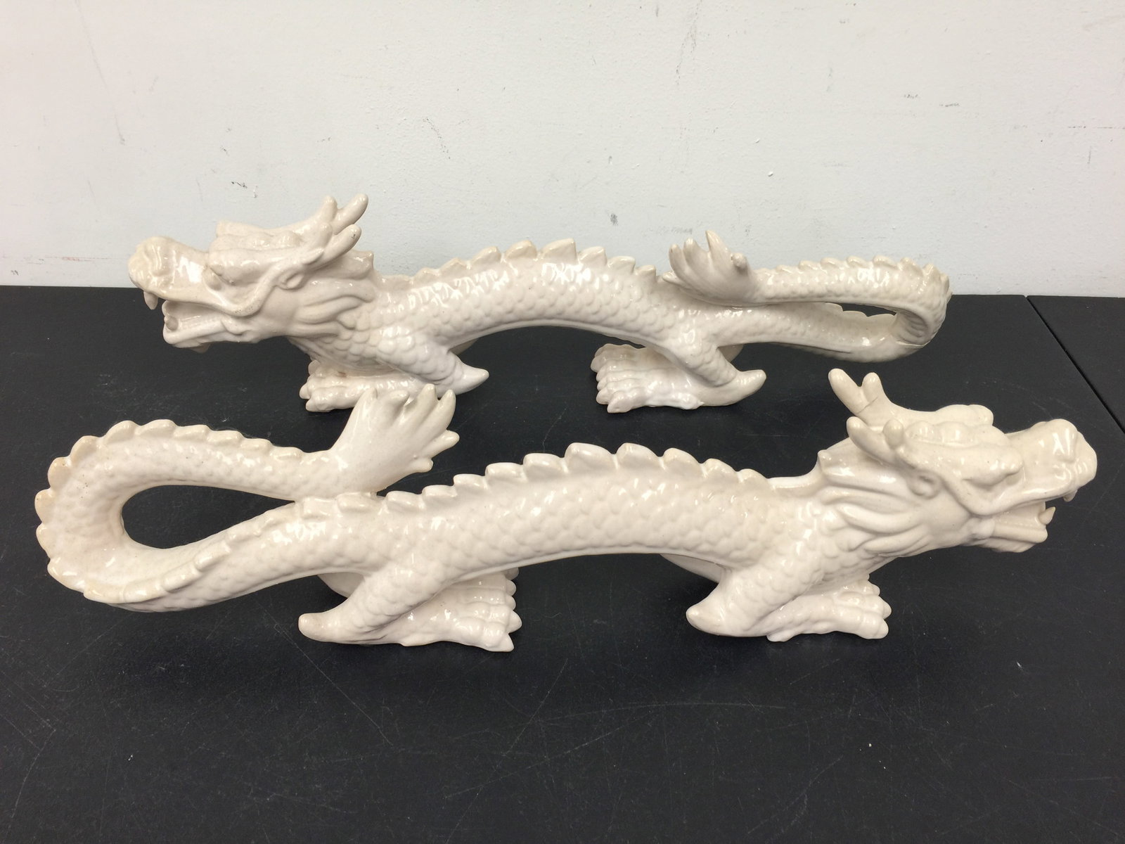 Pair of Porcelain Blanc de Chine Dragons: 21" L