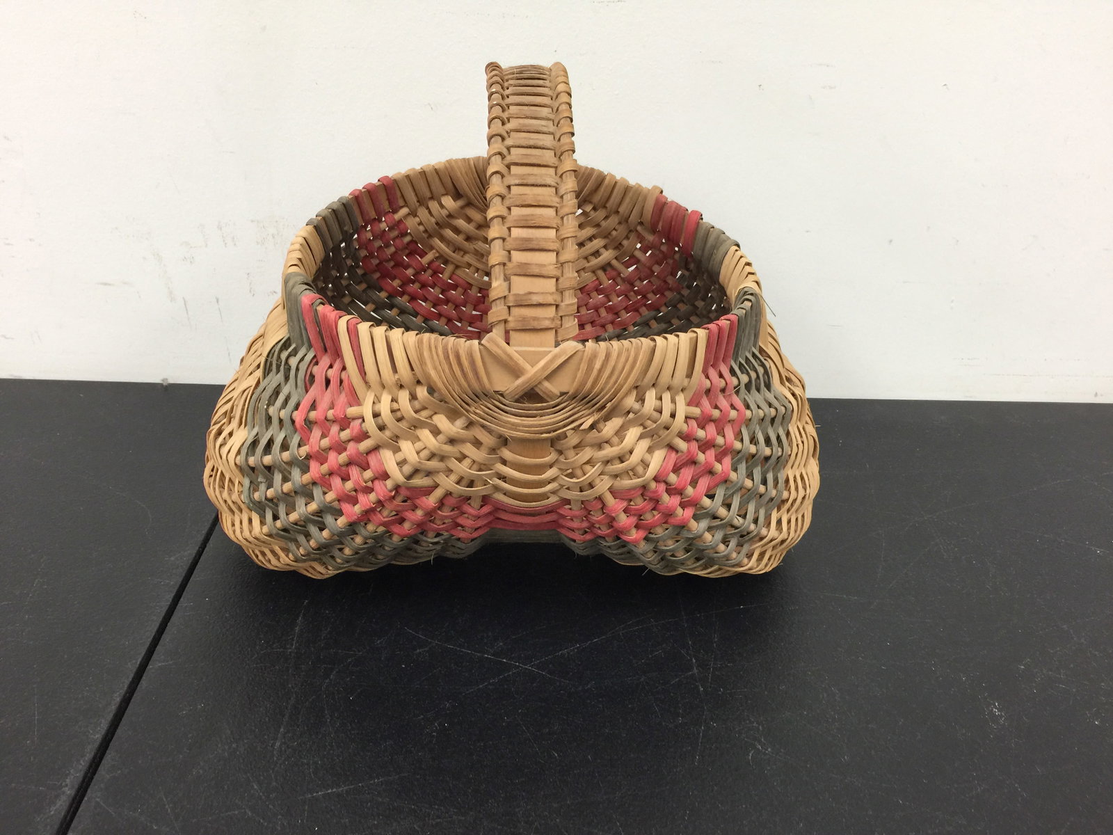 Vintage Artist Signed Painted Buttocks Basket: blue and red, signed "JEL" on underside. 14"x13".
