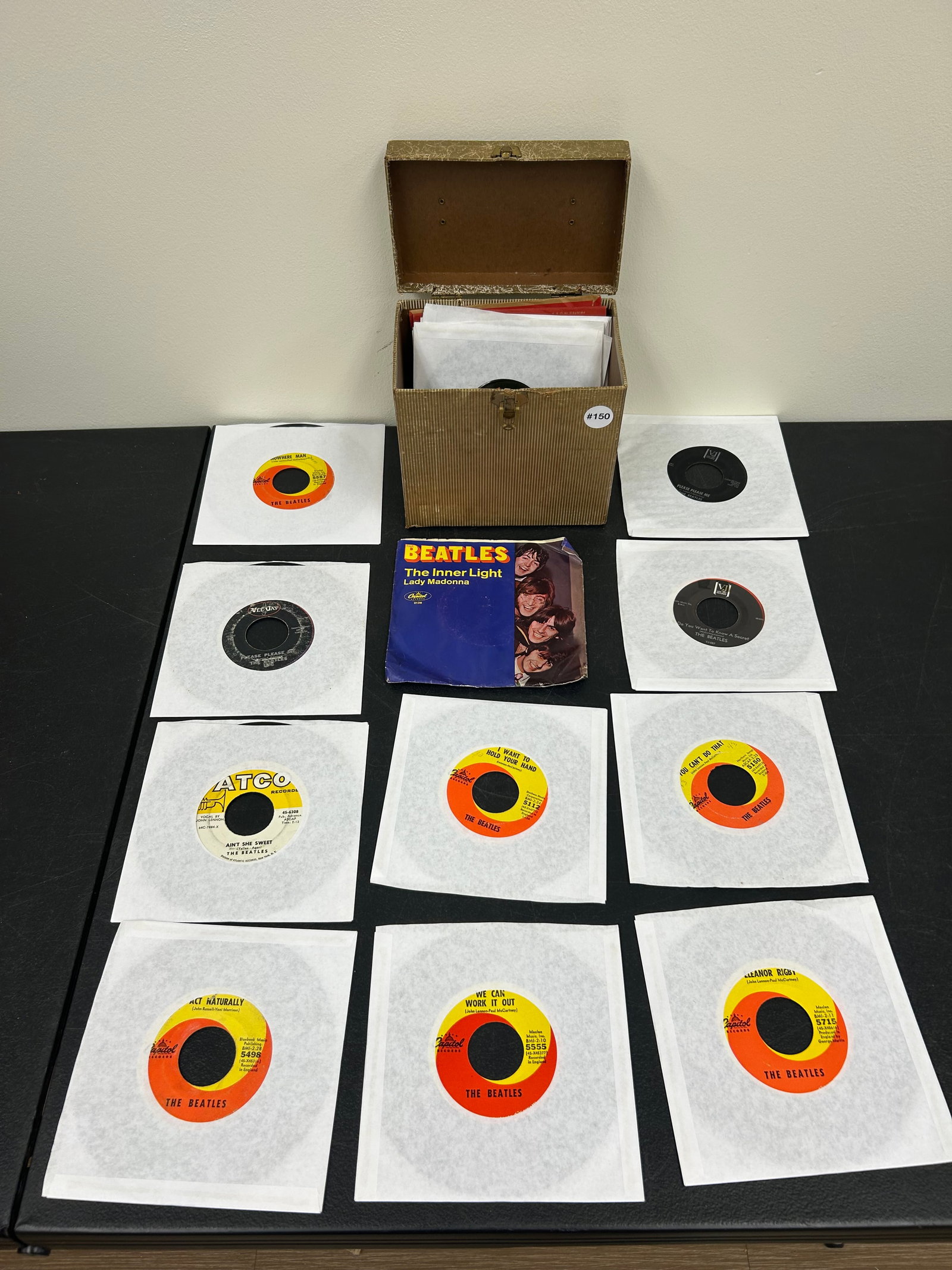 Vintage Beatles 45 Records: One has original sleeve. All vintage records with newer sleeves. Includes George Harrison and Yoko