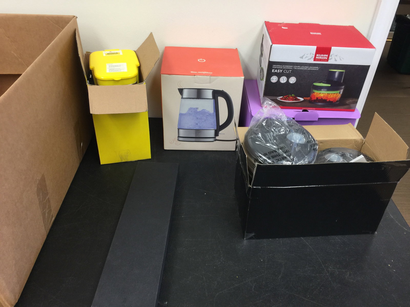 NIB Home Goods: Includes a glass bowl chopper, water kettle, coffee machine, portable cooker and more.