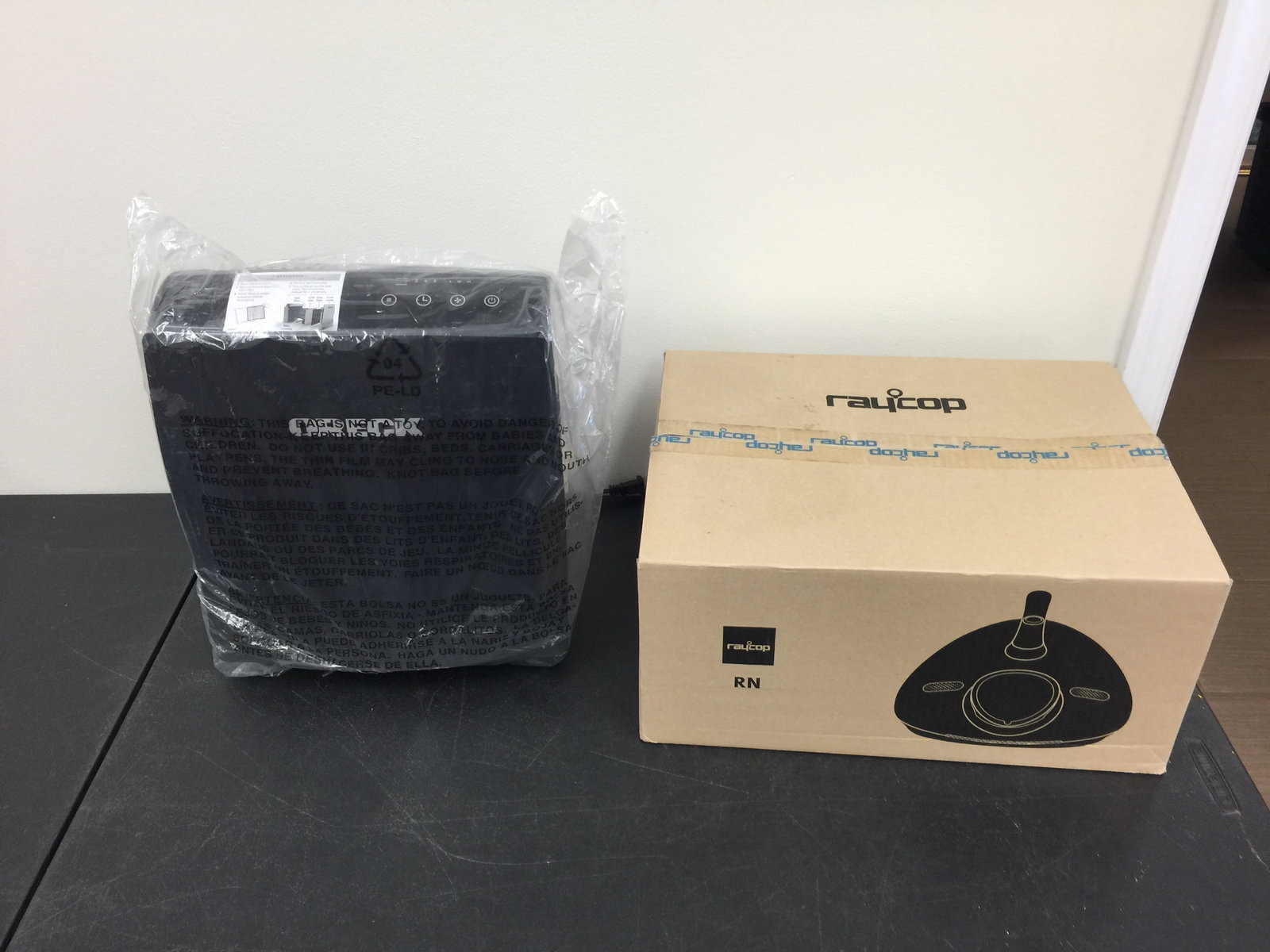 2 Air Purifiers: Includes Orech & Rayoops.