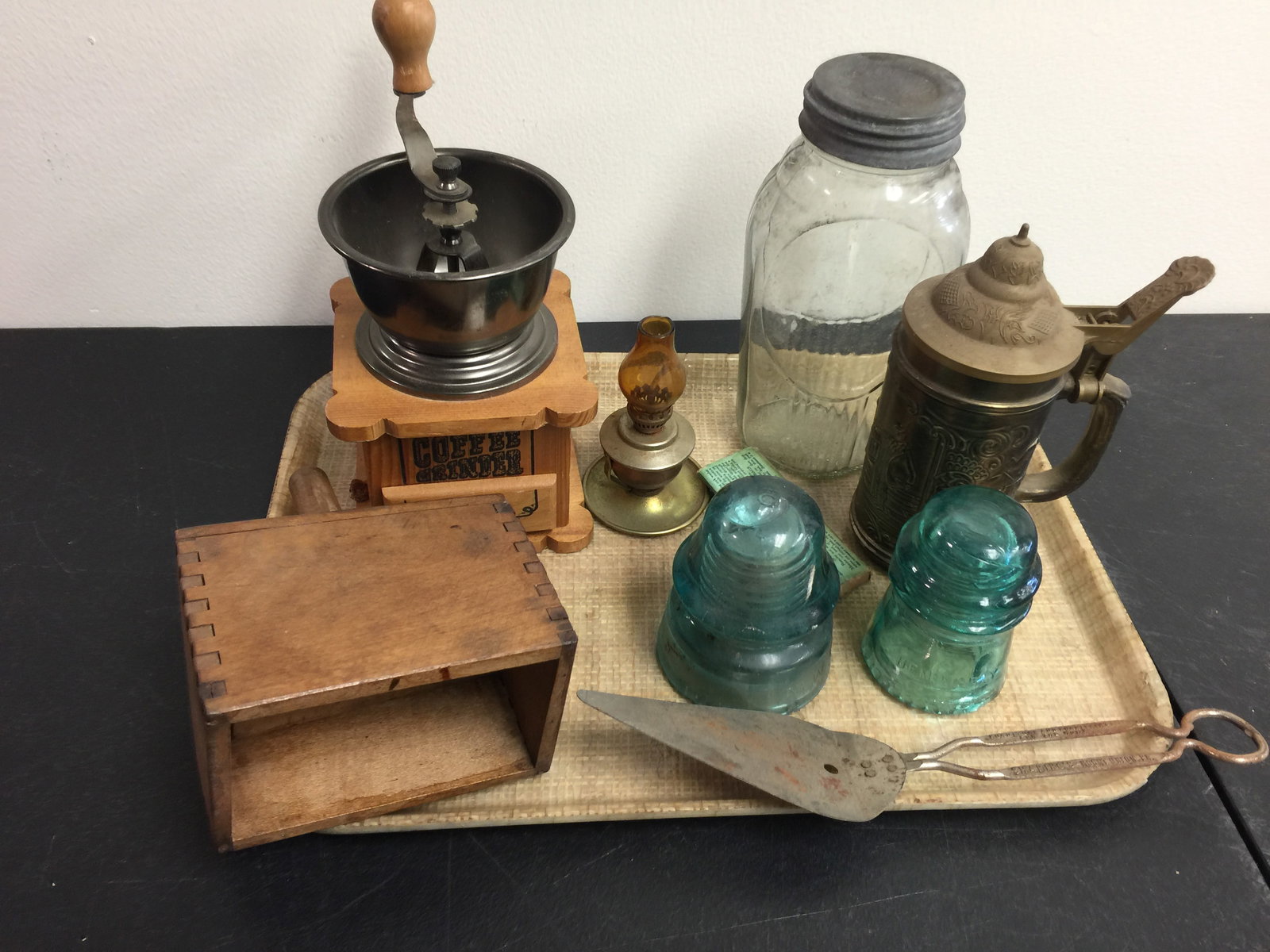 Country Lot: Coffee grinder, butter stamp, insulators and more. LArgest 9".