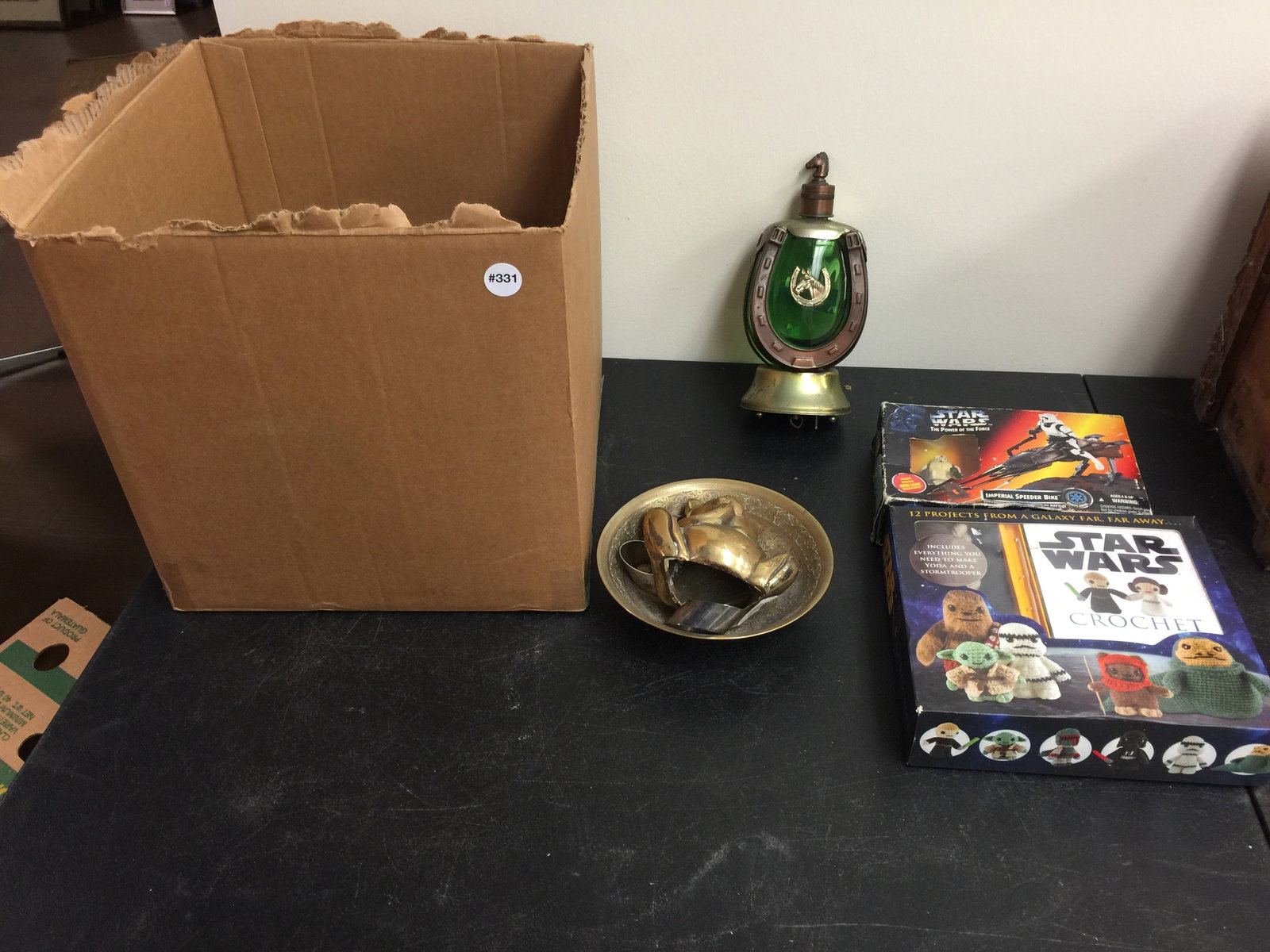 Collectible Lot: Includes Star Wars, mixed brass pieces, m&m collectibles, Northern Exposure DVDs and more.