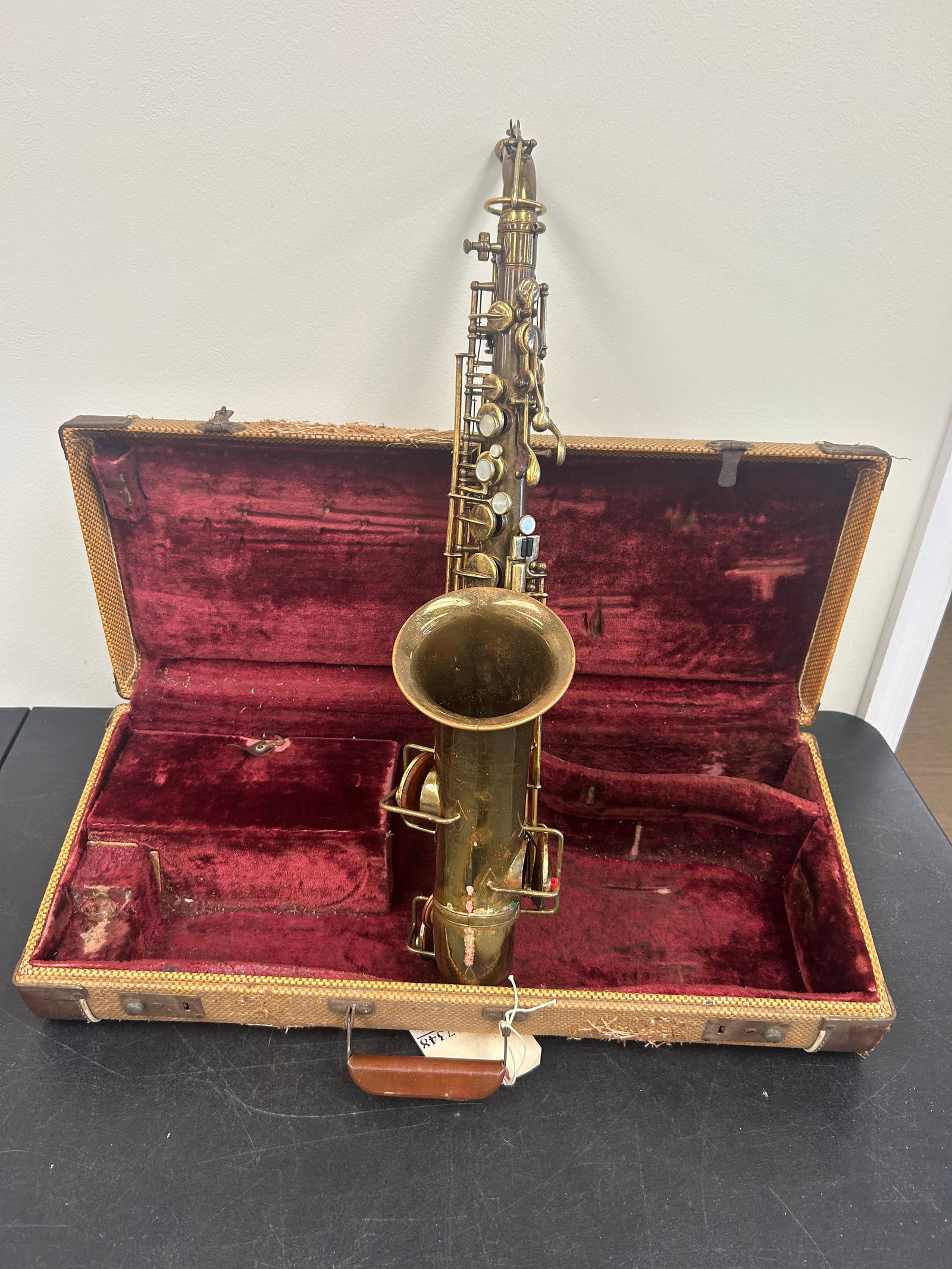 Vintage Buescher Alto Saxophone: in original case 24" x 10", sax is signed on front, includes mouth piece, sax is 28" long