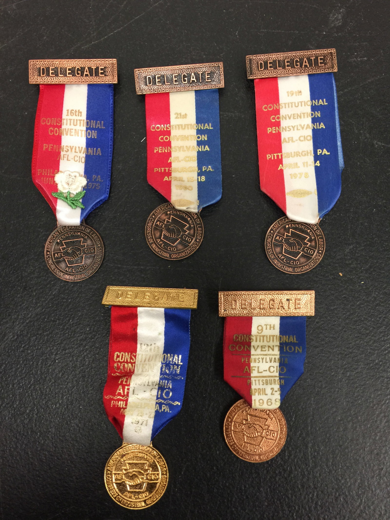 5 Vintage AFL-CIO Pennsylvania Delegate Badges: 4.75" L. Dated 1968, 1971, 1975, 1978, 1980.
