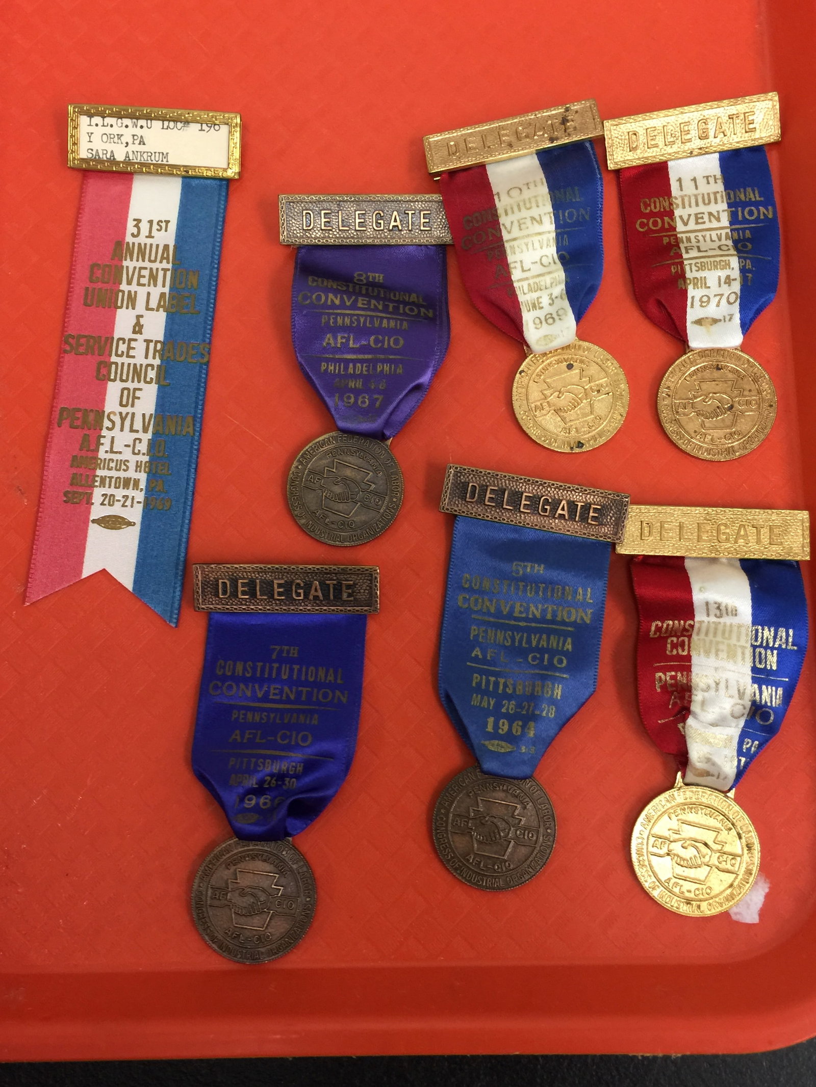 7 Vintage AFL-CIO Pennsylvania Delegate Badges: Largest 5.75" L. Dated 1964, 1966, 1967, 1969, 1970, 1977