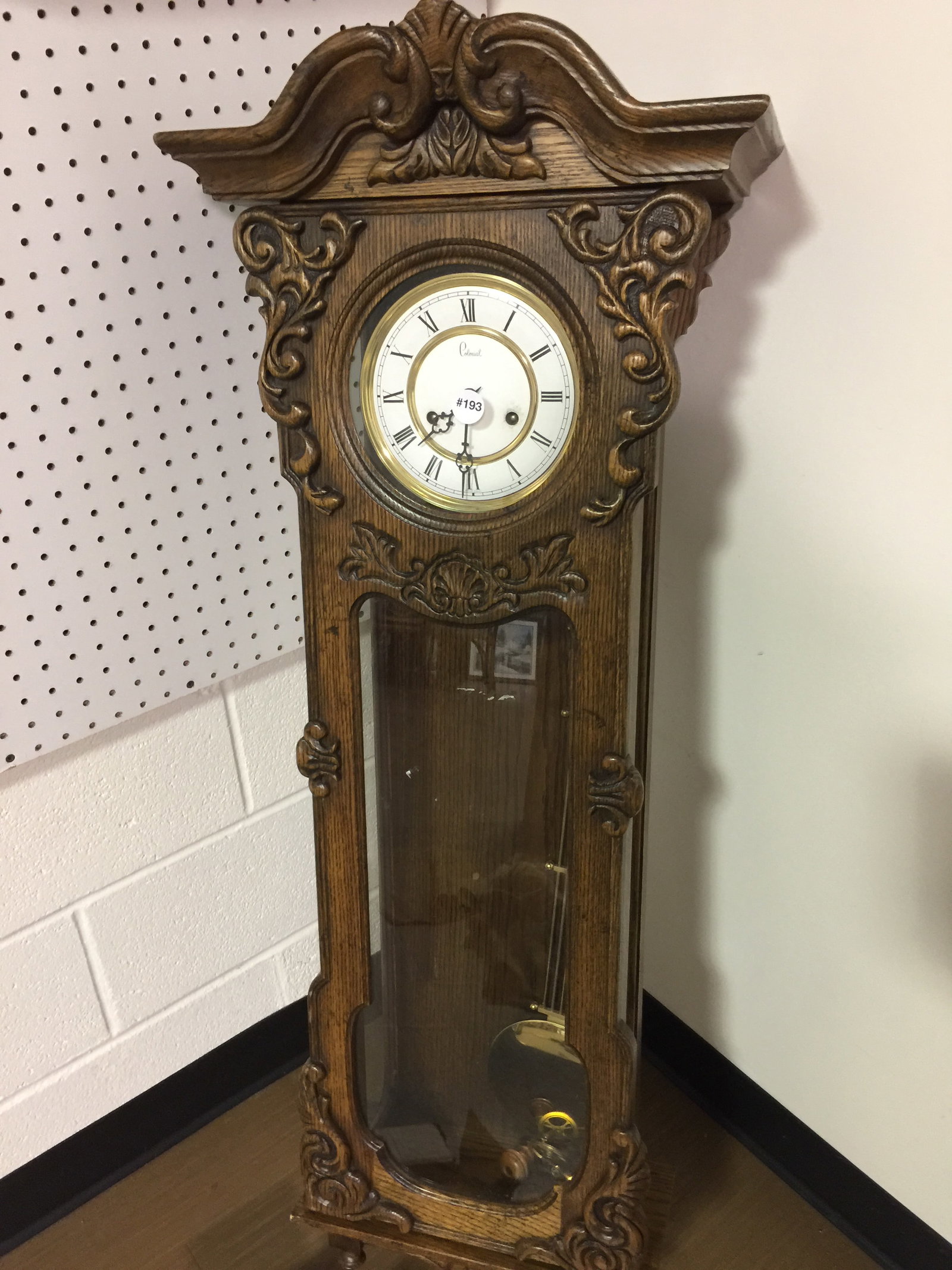 Colonial Oak Weight Driven Clock: 50" H. Includes weights, pendulum & key.
