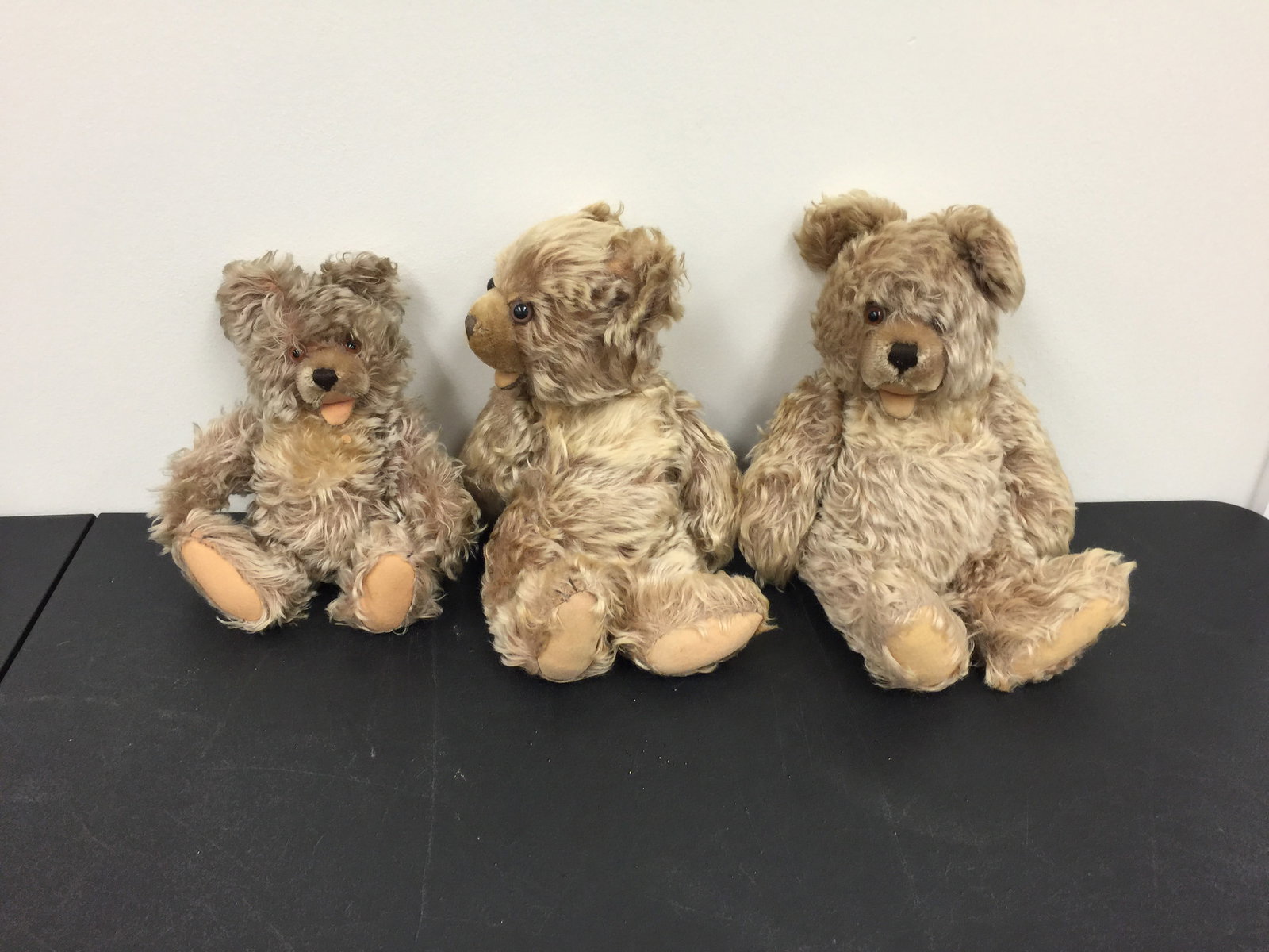 3 Vintage Mohair Jointed Bears: All have glass eyes. Largest 14" H. Possibly Steiff, but no tags.