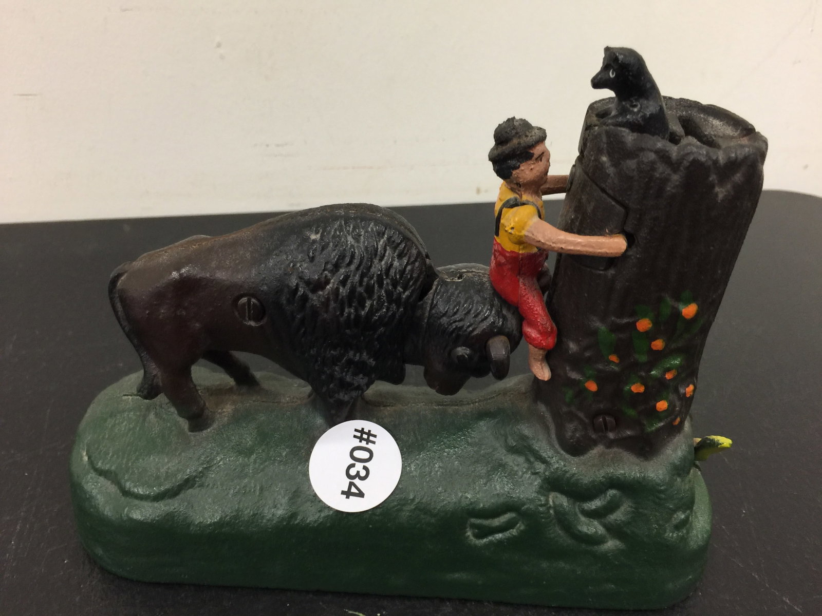 Butting Buffalo Mechanical Bank: Book of knowledge, 7.5"W.