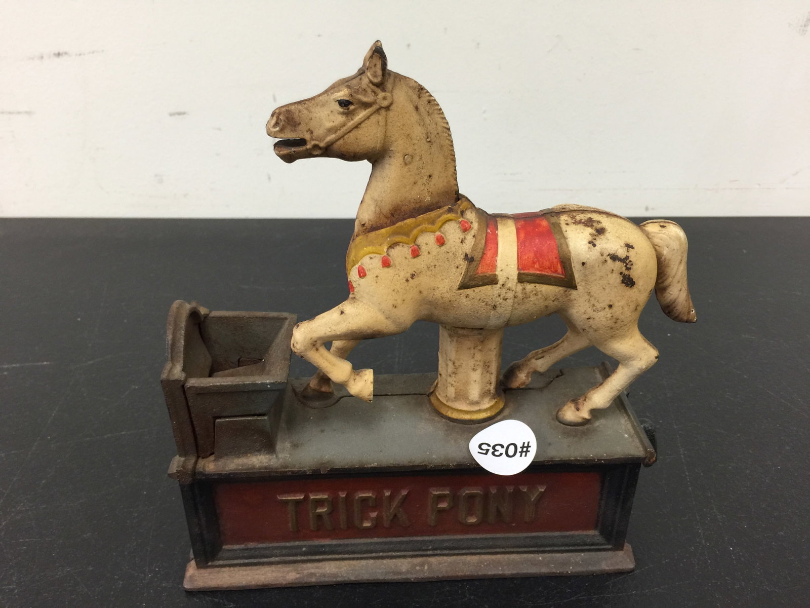 Trick Pony Mechanical Bank: Book of knowledge, 8"W.