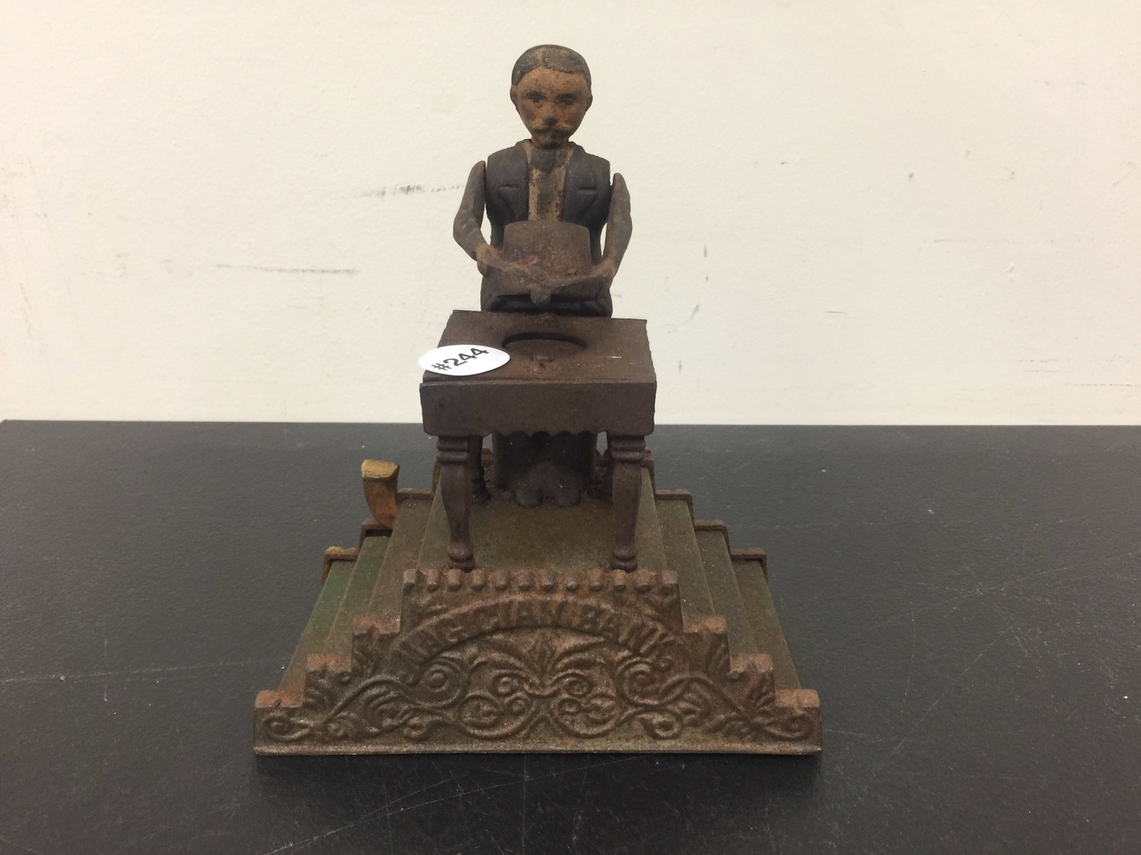 Antique Magician Mechanical Bank: 7" x 7".