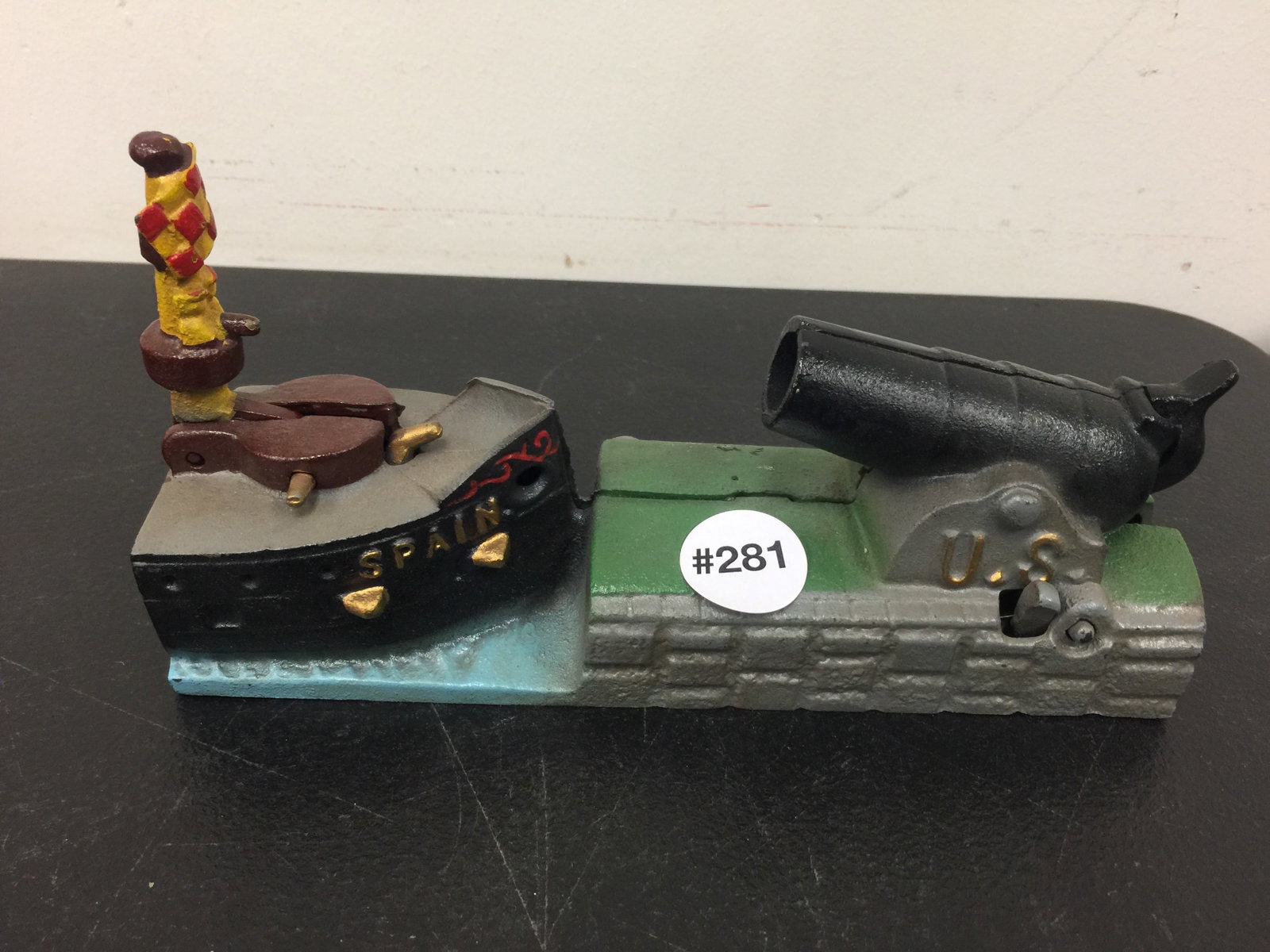 Spain vs US Mechanical Bank: book of knowledge, 9".