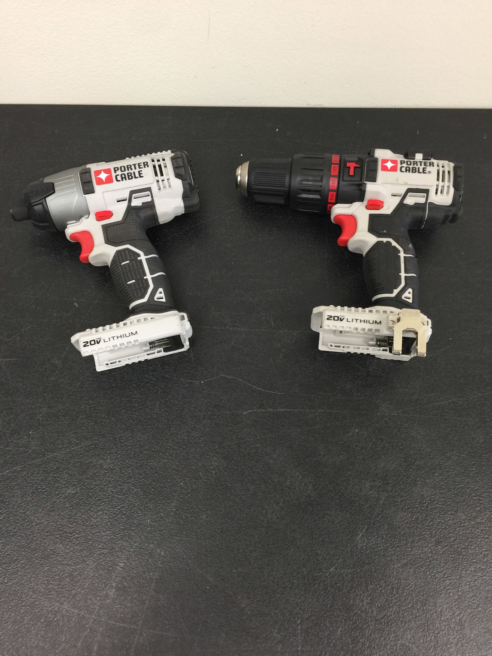 2 Porter Cable Drills: larger is 8" long and 1/2"