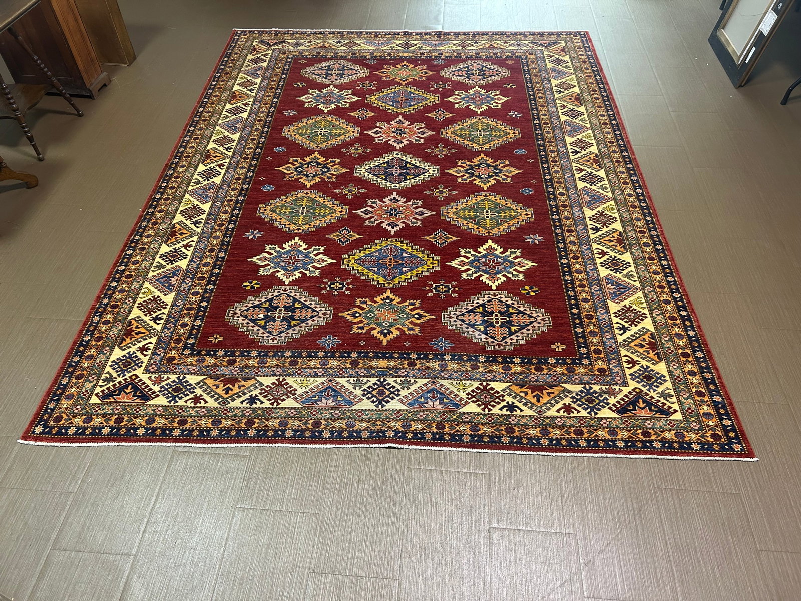Vintage Kazak Carpet: 113" x 150", hand knotted