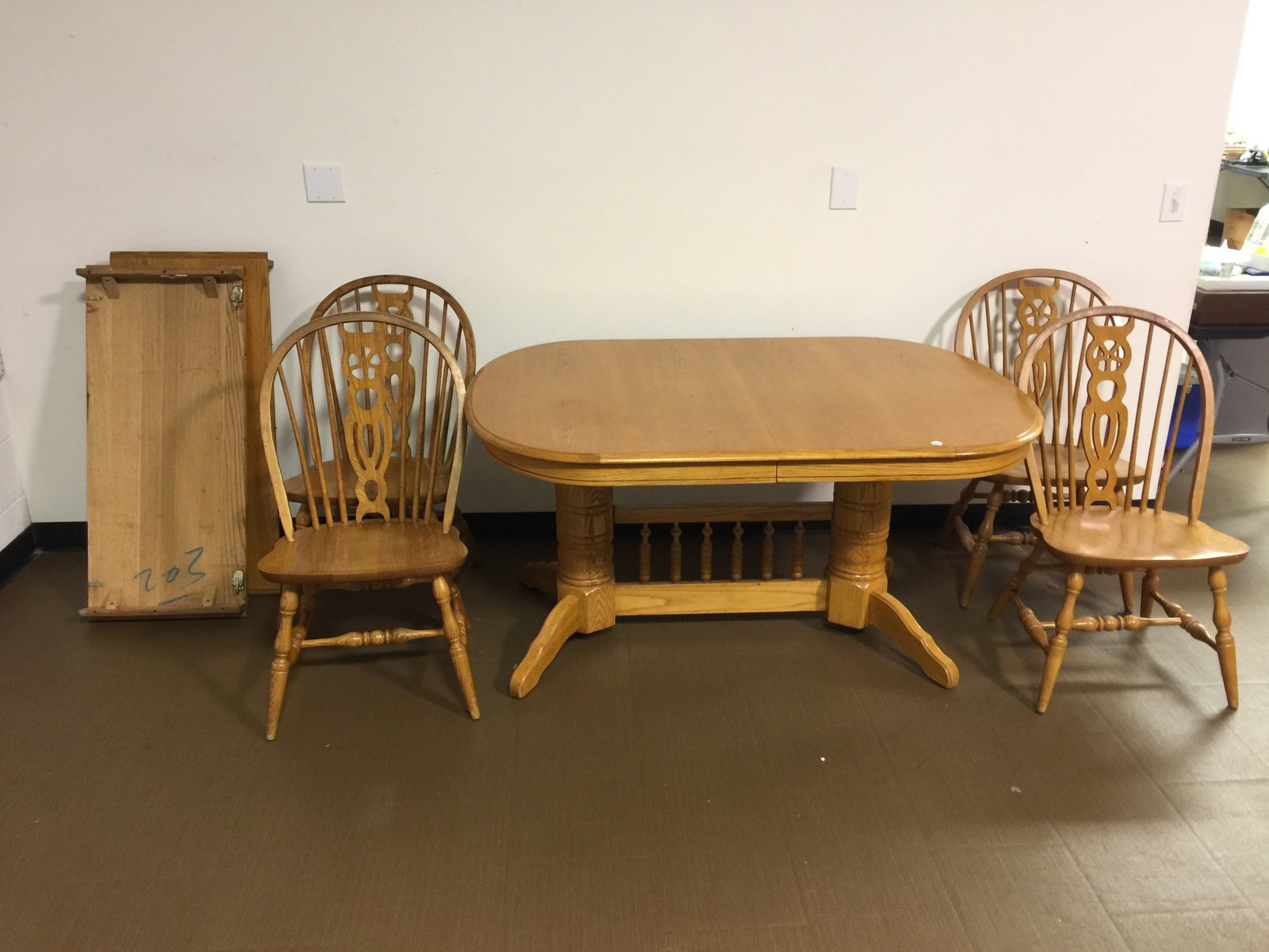 Oak Table and Four Chairs Logatec: table, 60"x42"x30", chairs are marked, "Made in Slovenia Logatec", two board.