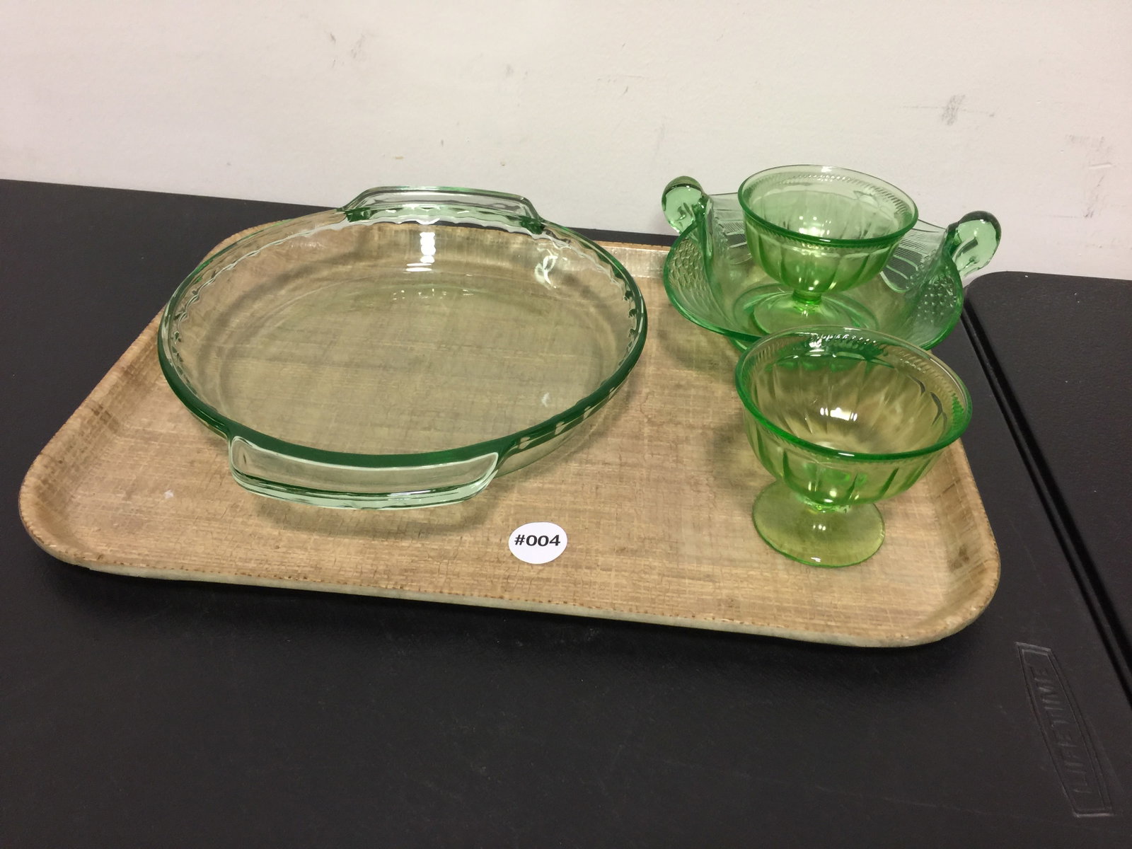Uranium Depression Glass: Includes swan handle dish. Largest measures 11". All pieces glow.
