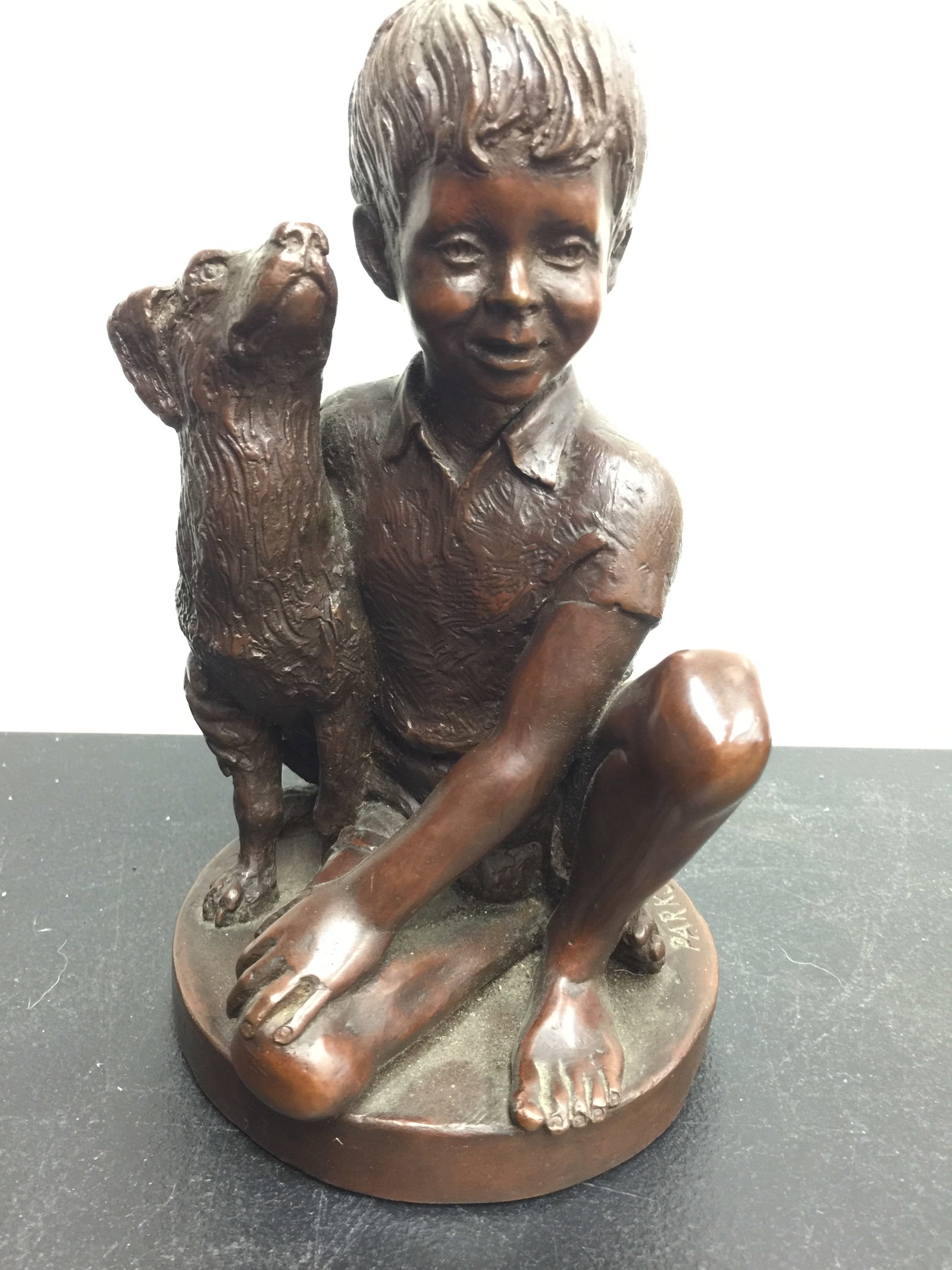 Signed Bronze Boy with Dog: 9" x 5", signed Parks and dated 1974