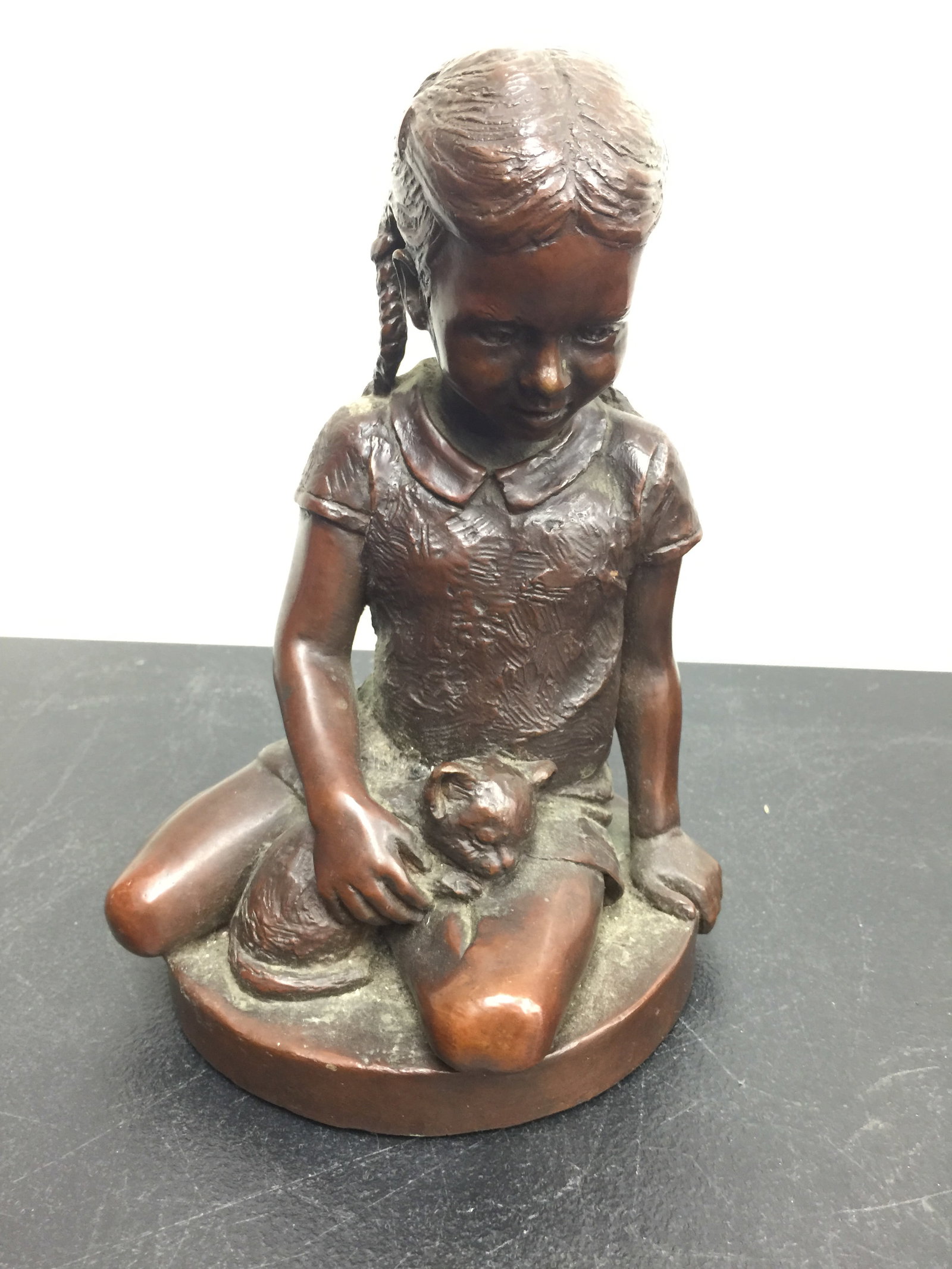 Signed Bronze Girl with Cat: 9" x 5", signed Parks and dated 1974