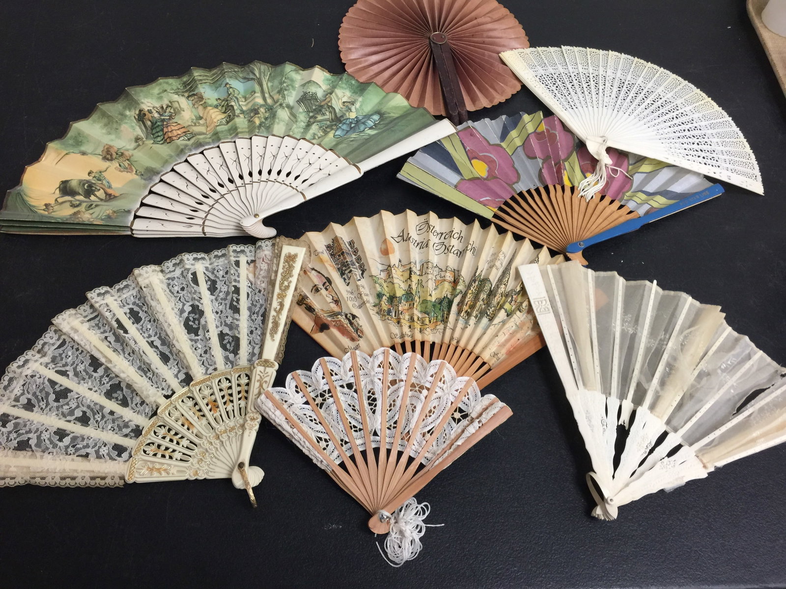 Decorative Fans: mainly continental, various sizes, themes and material.