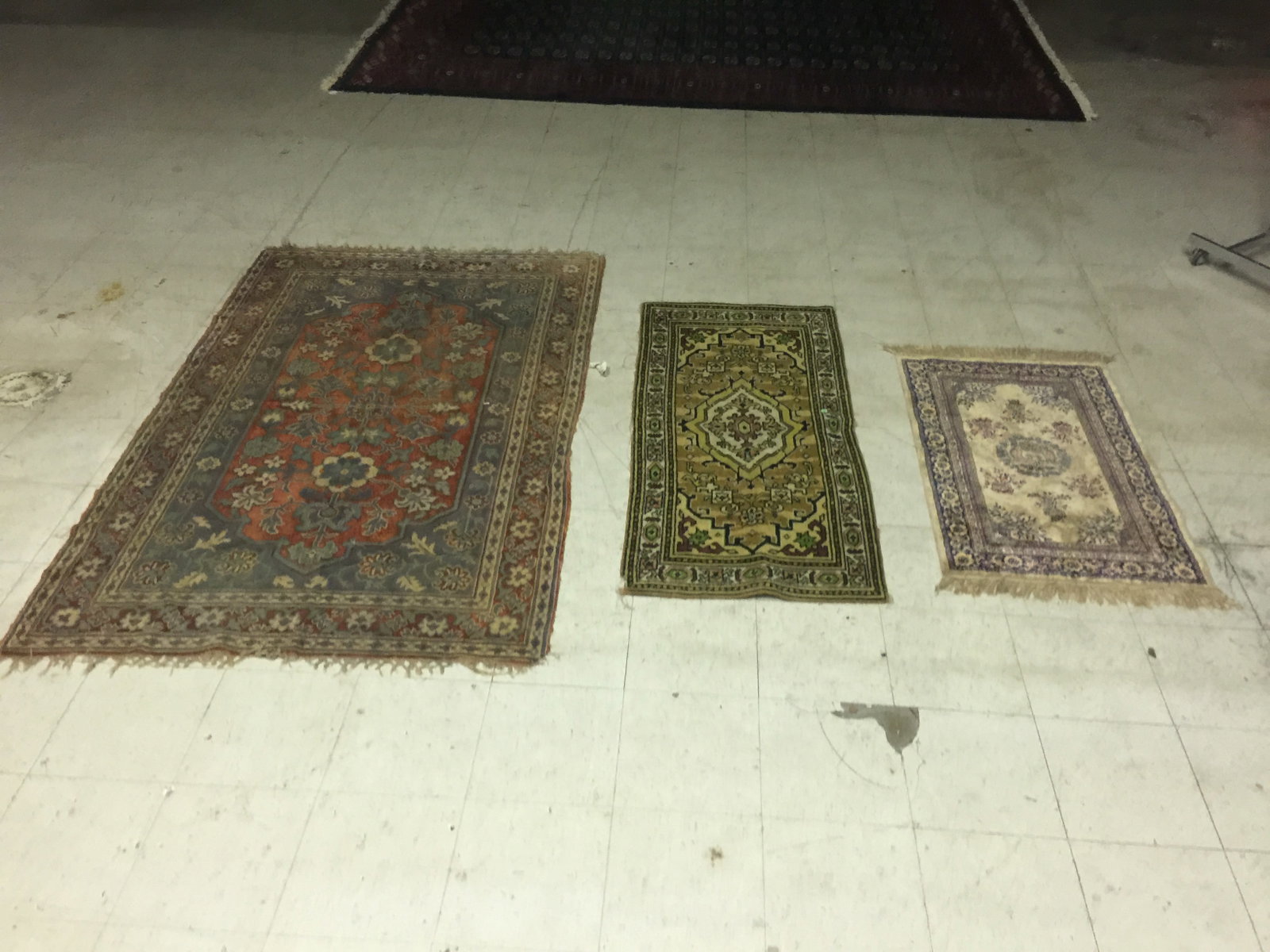 3 Oriental Rugs: One is hand woven. Various sizes.