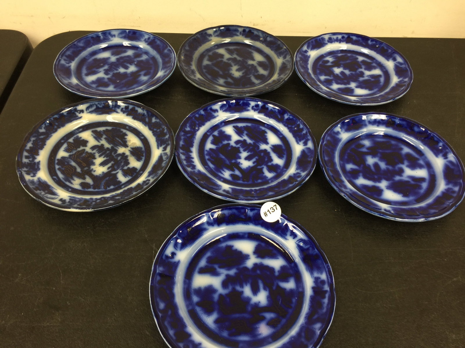 7 Flow Blue Manilla Plates: All are 8".