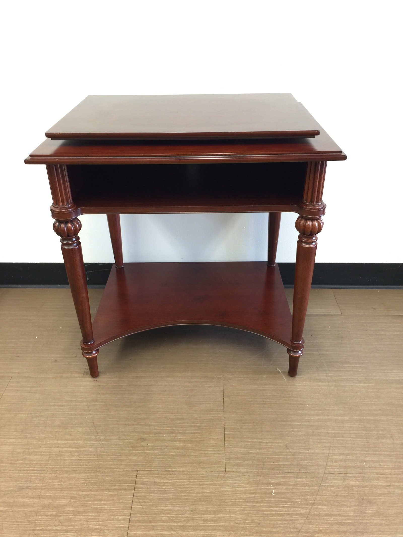 Mahogany TV Stand: 26" x 20" x 28", has removable, rotating top, by Bombay Co.