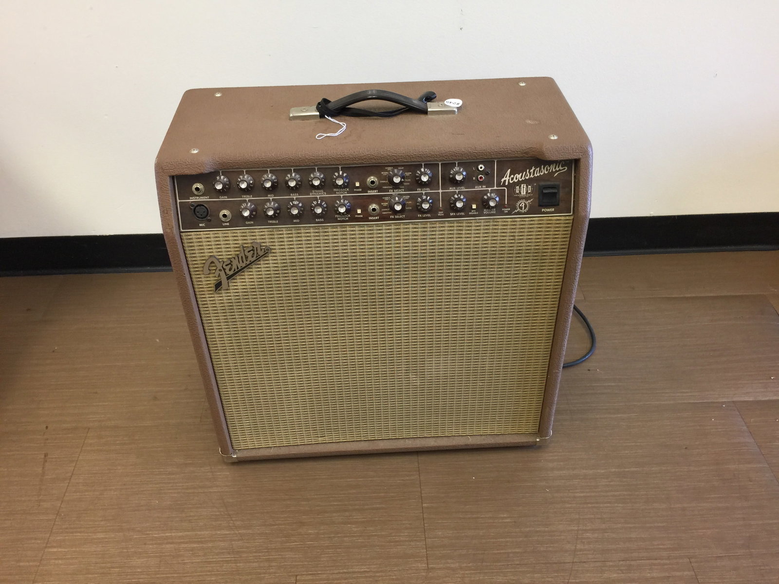 Fender Acoustasonic SFX II Amplifier: featuring stereo field expansion, type: pr 542, serial number M1382608. 22"x23".