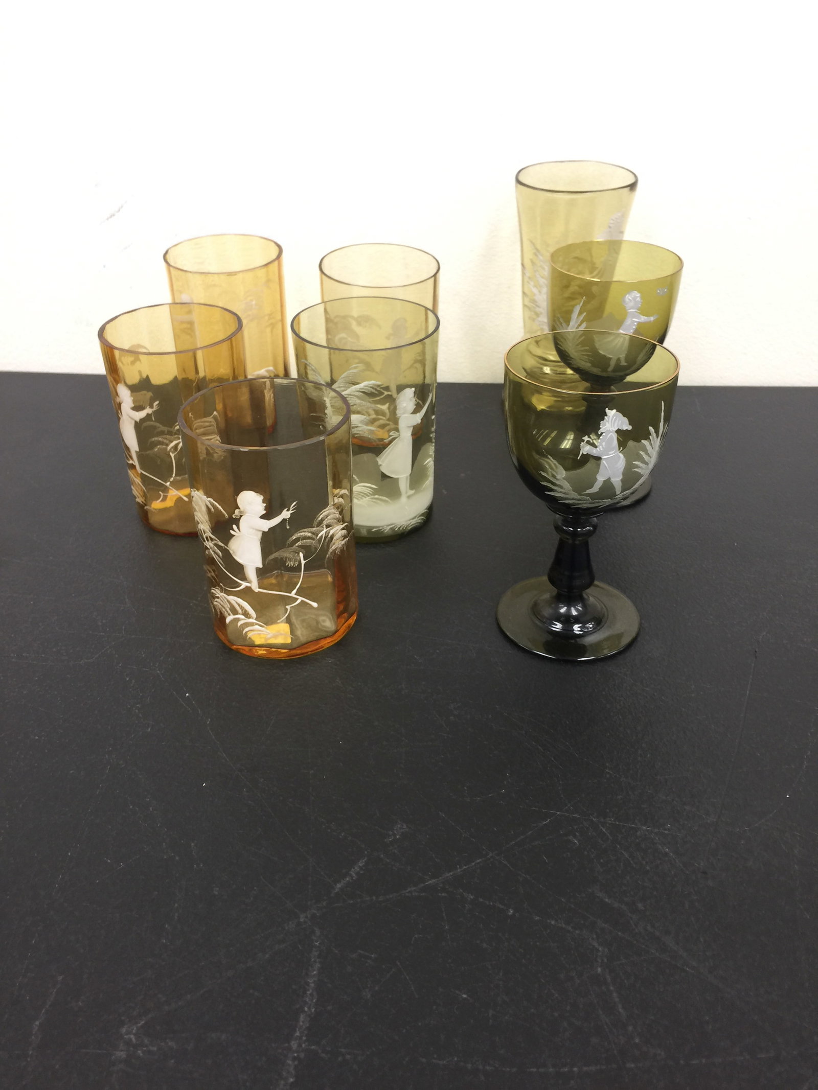 Mary Gregory Glass: includes 1 vase 5 1/2" tall, 5 matching tumblers, plus a pair of wine stems