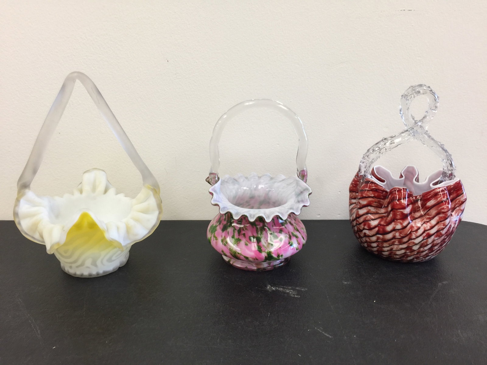 Art Glass Baskets (3): satin yellow, fenton and victorian glass. Largest, 9"H.