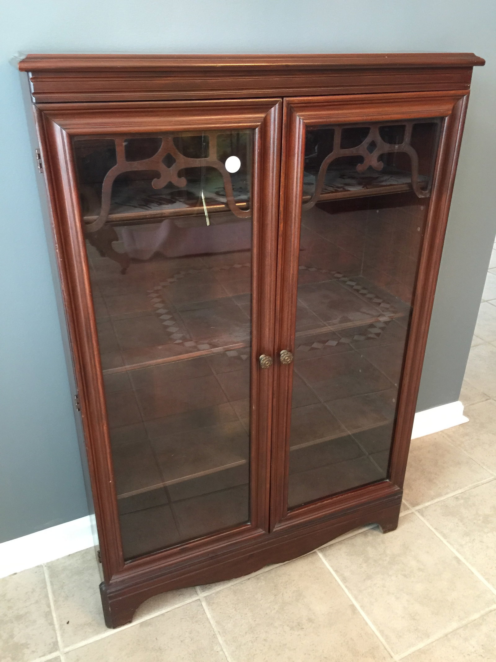 Mahogany Two Door Bookcase: 44"x30"x10".