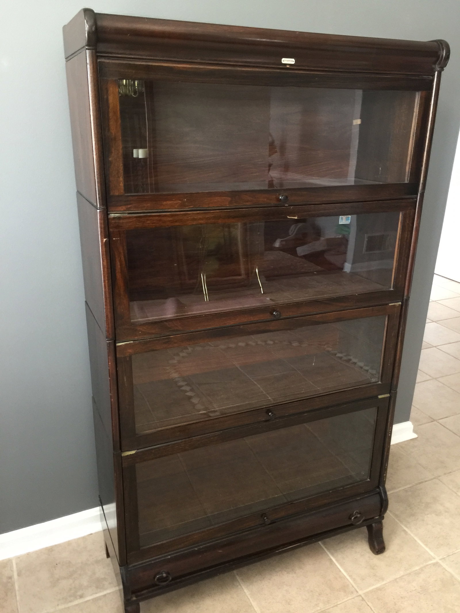 Lundstrum Four Stack Barrister Bookcase: has original label, base has bottom drawer. 34"x13"x60".