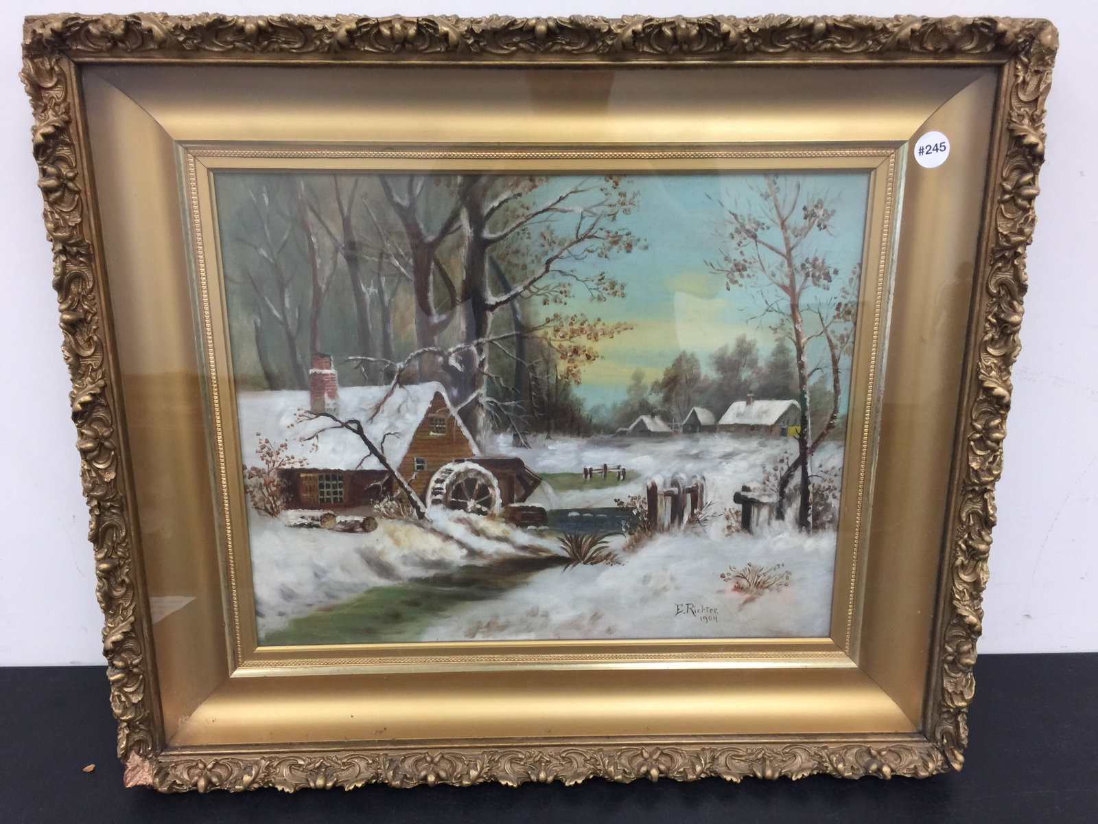 Signed Oil on Canvas: SLR, E.Richter, dated 1904. Winter scene with cottages and a stream in snowy landscape. Under glass. Exposed 19" x 15", frame 28" x 24".