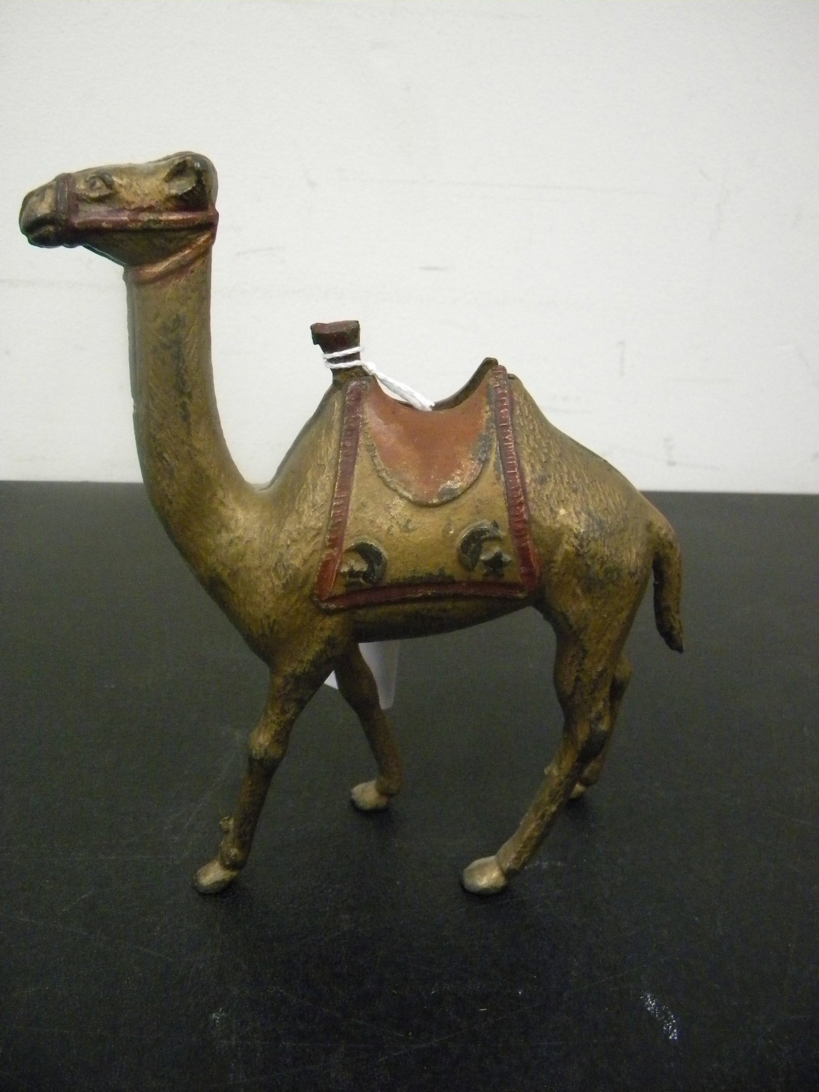 Antique Cast Iron Still Camel Bank: has original paint, 7" x 6"