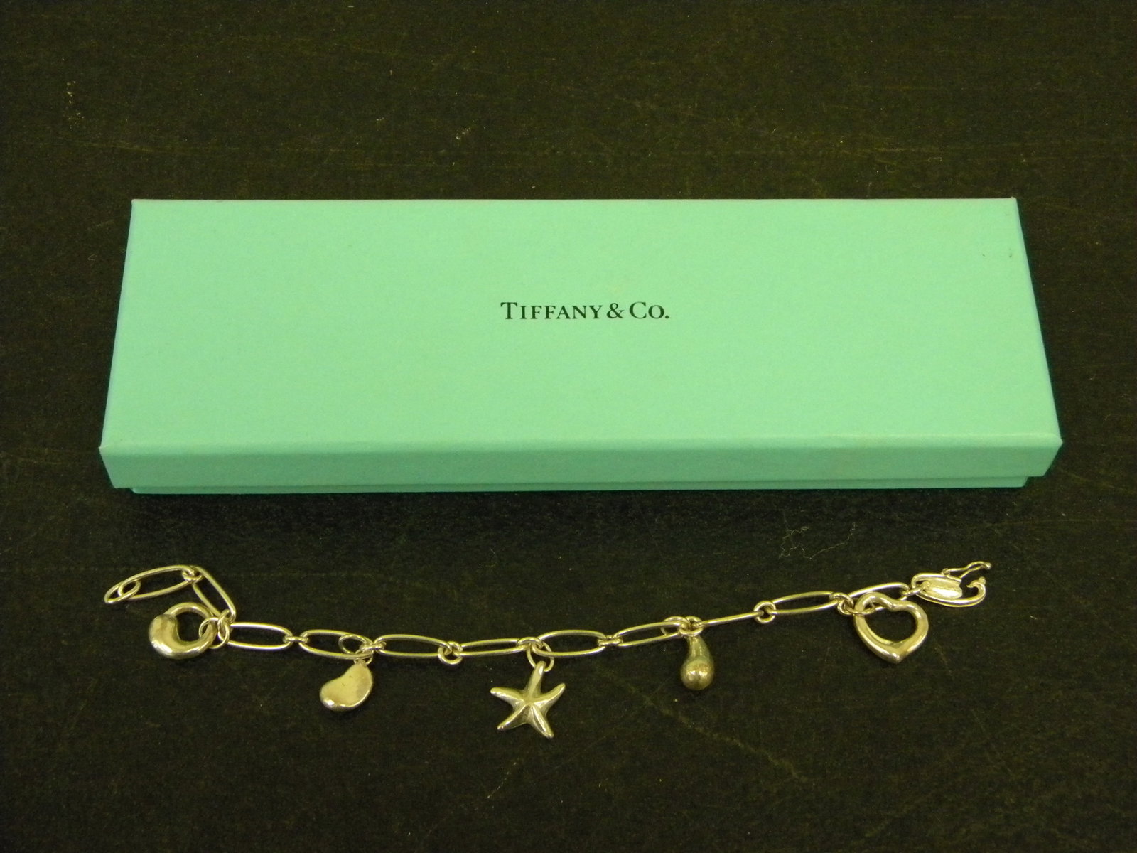 Tiffany Sterling Charm Bracelet: .5ozt, 7".