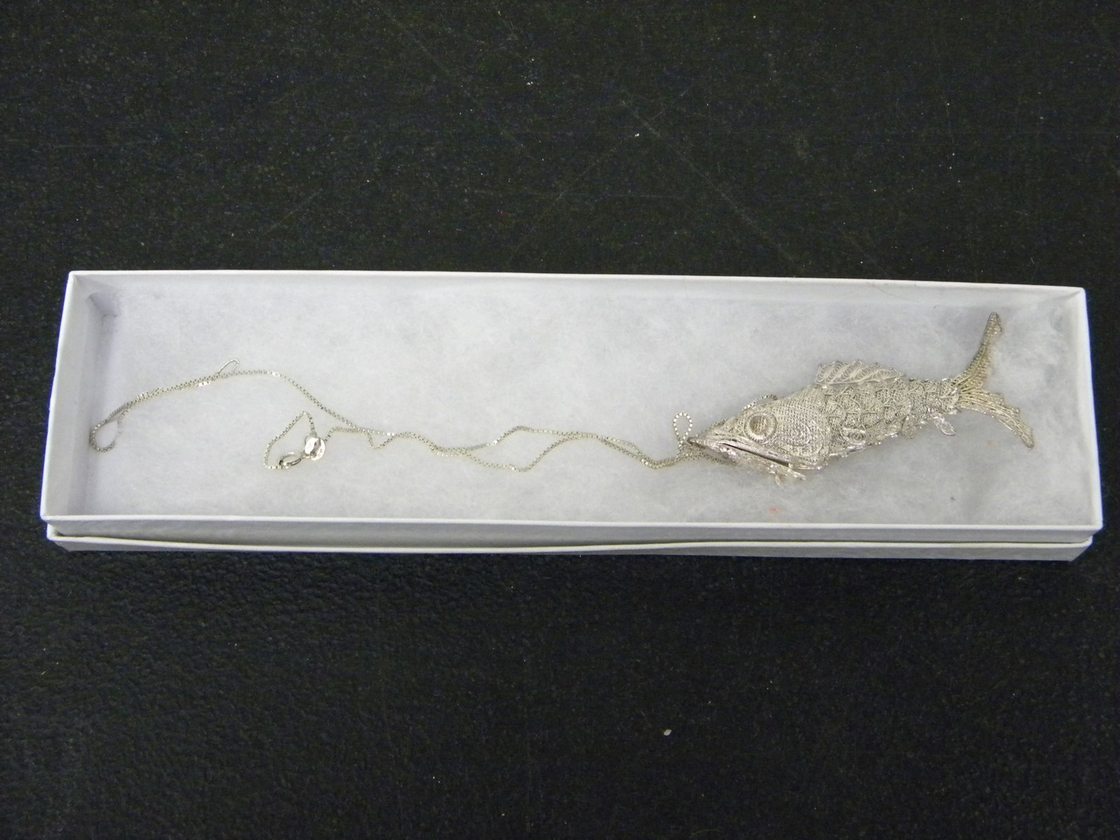 Silver Fish Chain: fish marked silver and chain marked .925, 18"L. .445ozt.