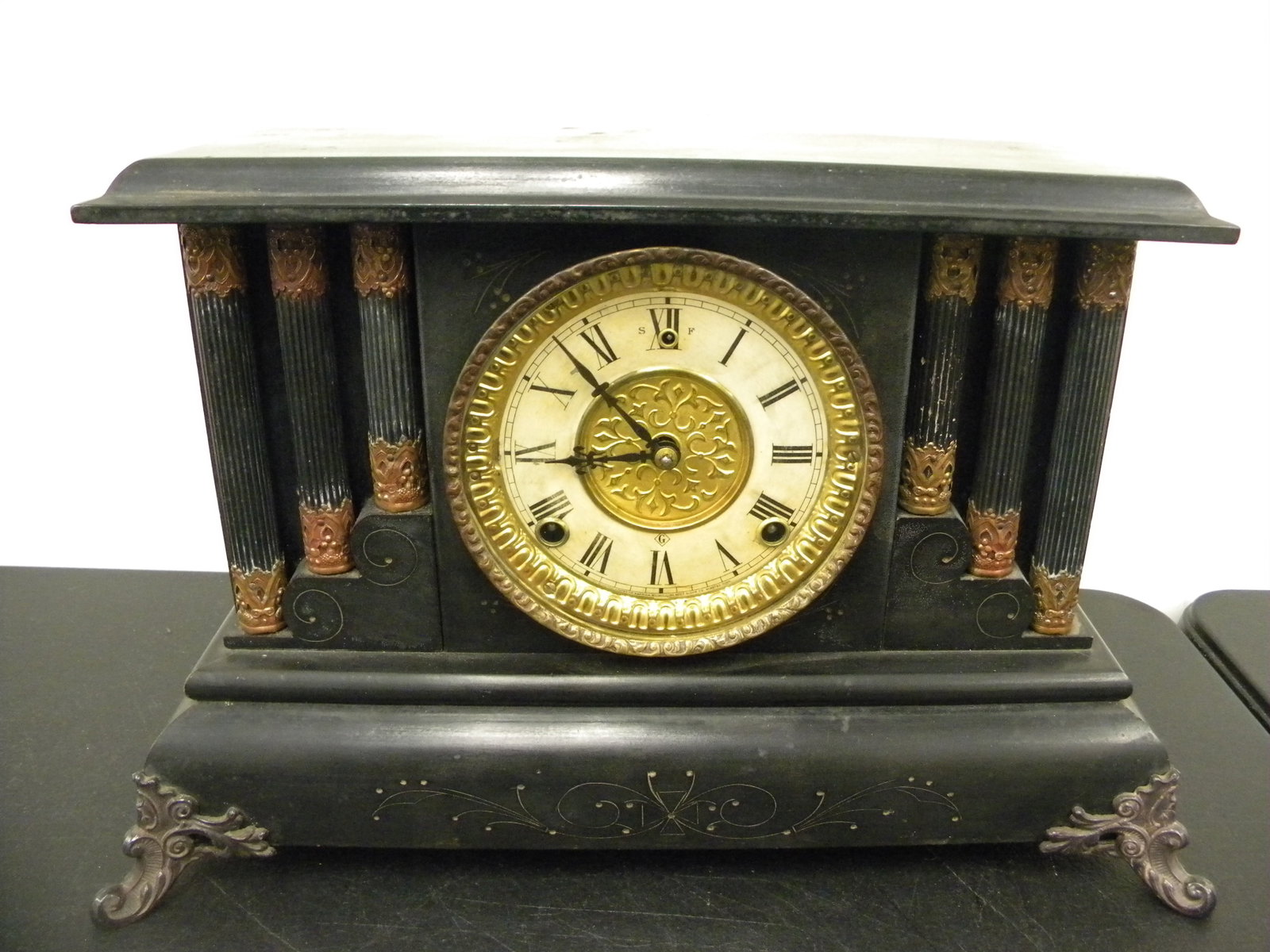 WM Gilbert Mantle Clock: label on bottom, has key/pendulum, 17"x11".