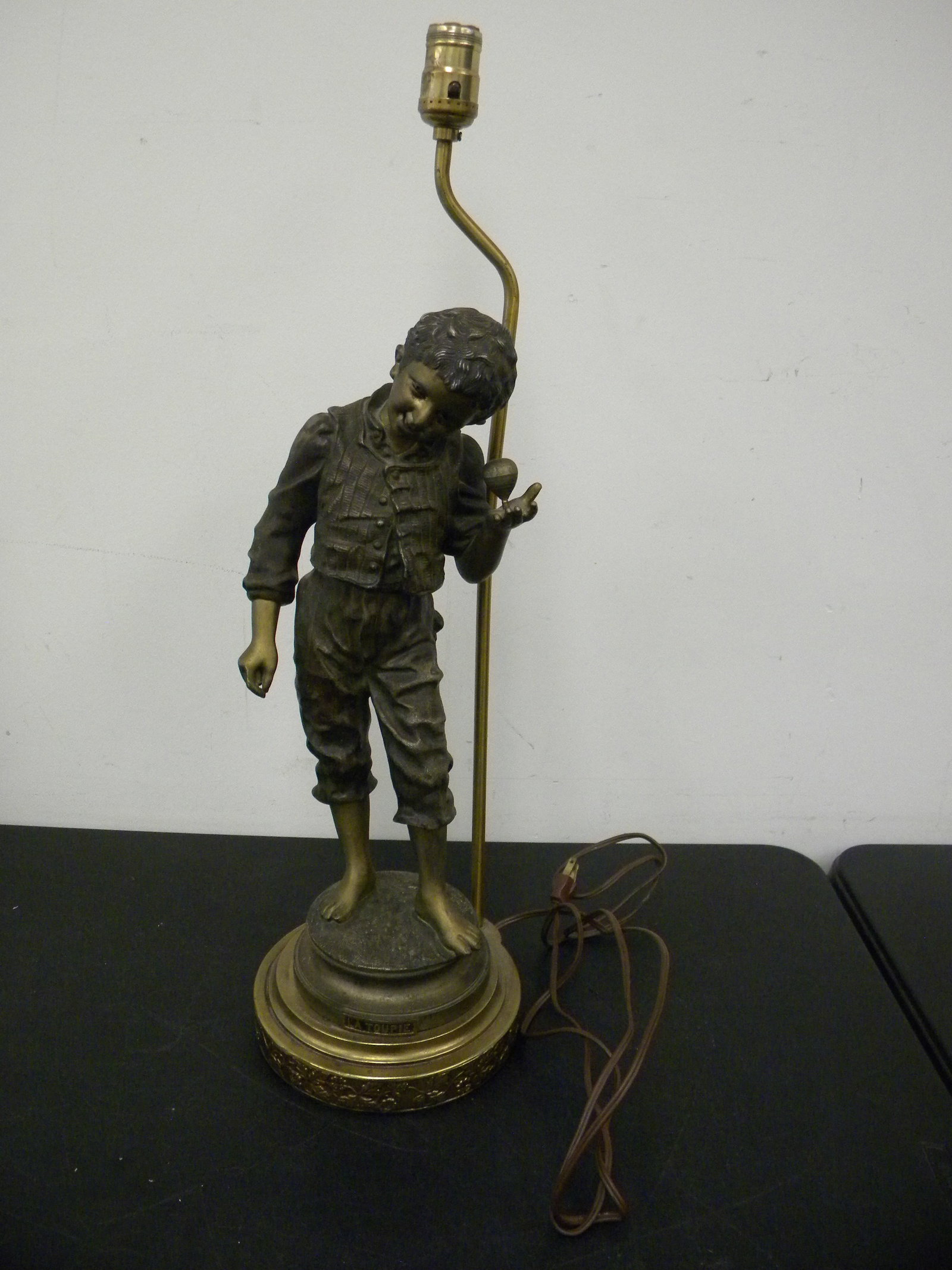 French Figural Lamp: signed "La Toupie". 22"H.