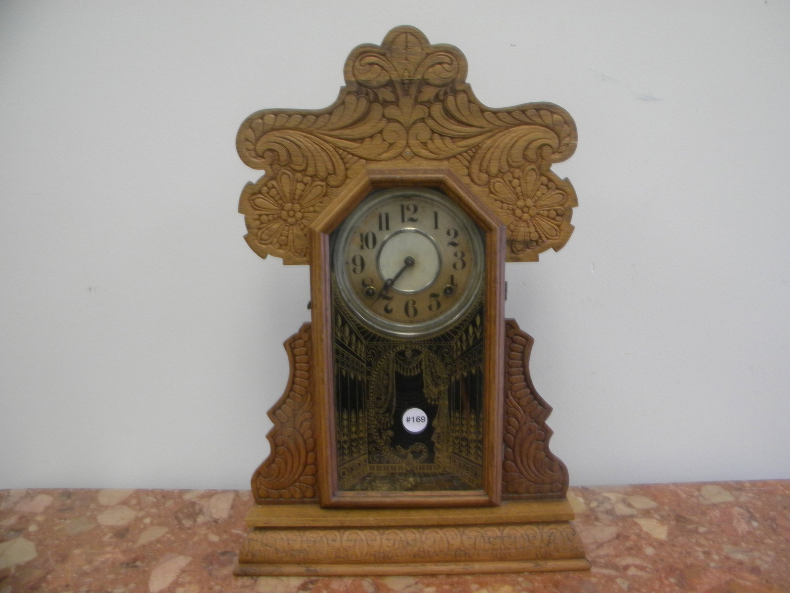 Ingraham Carved Gingerbread Clock: has key/pendulum, 15"x23".