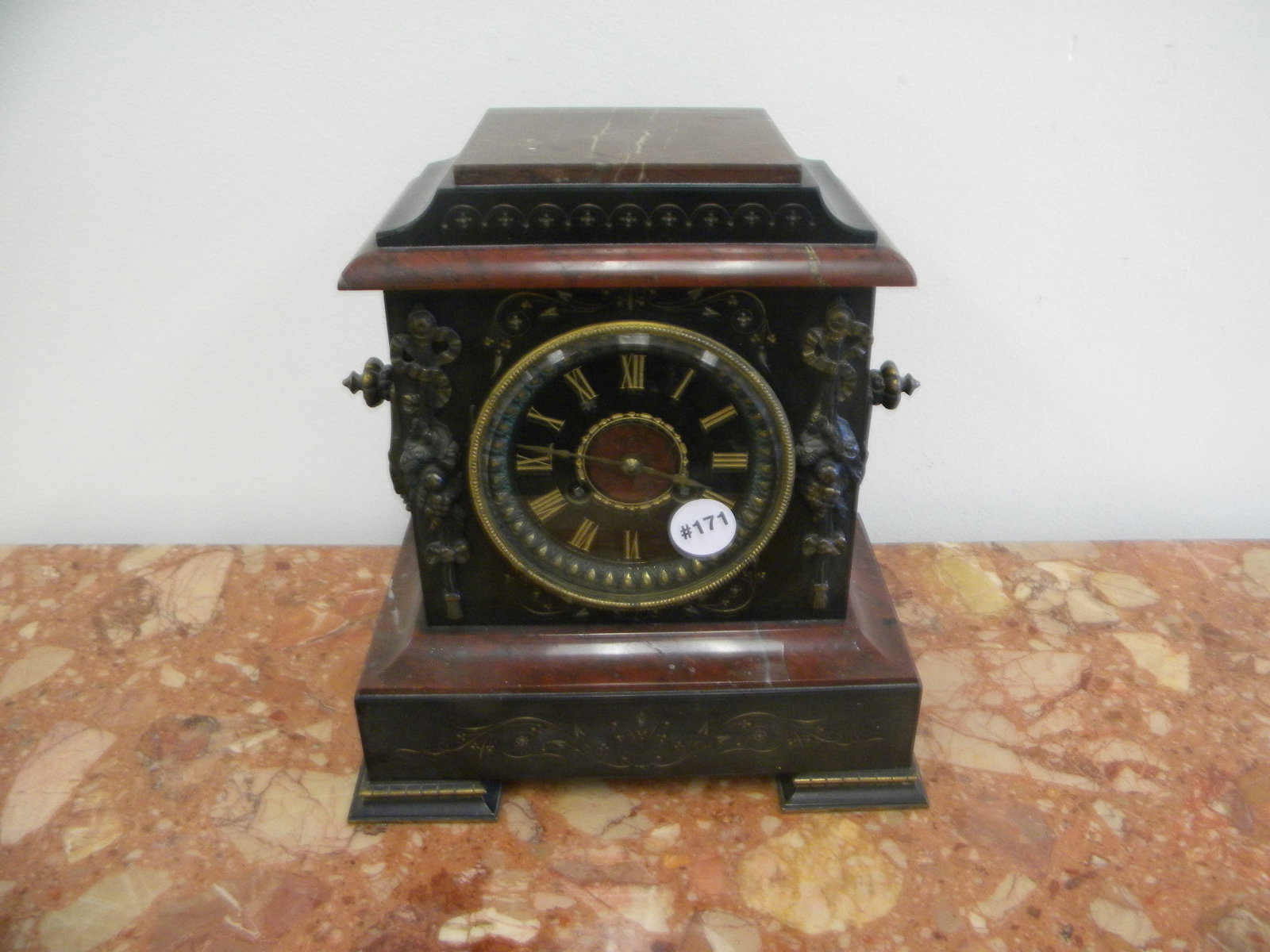 French Marble and Iron Clock: has key/pendulum, handled, marked "LP" on works. 10"x11".