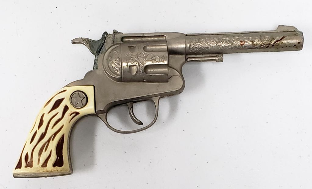 VINTAGE COWBOY DIE CAST GOLD HALCO CAP GUN -: BID NOW!