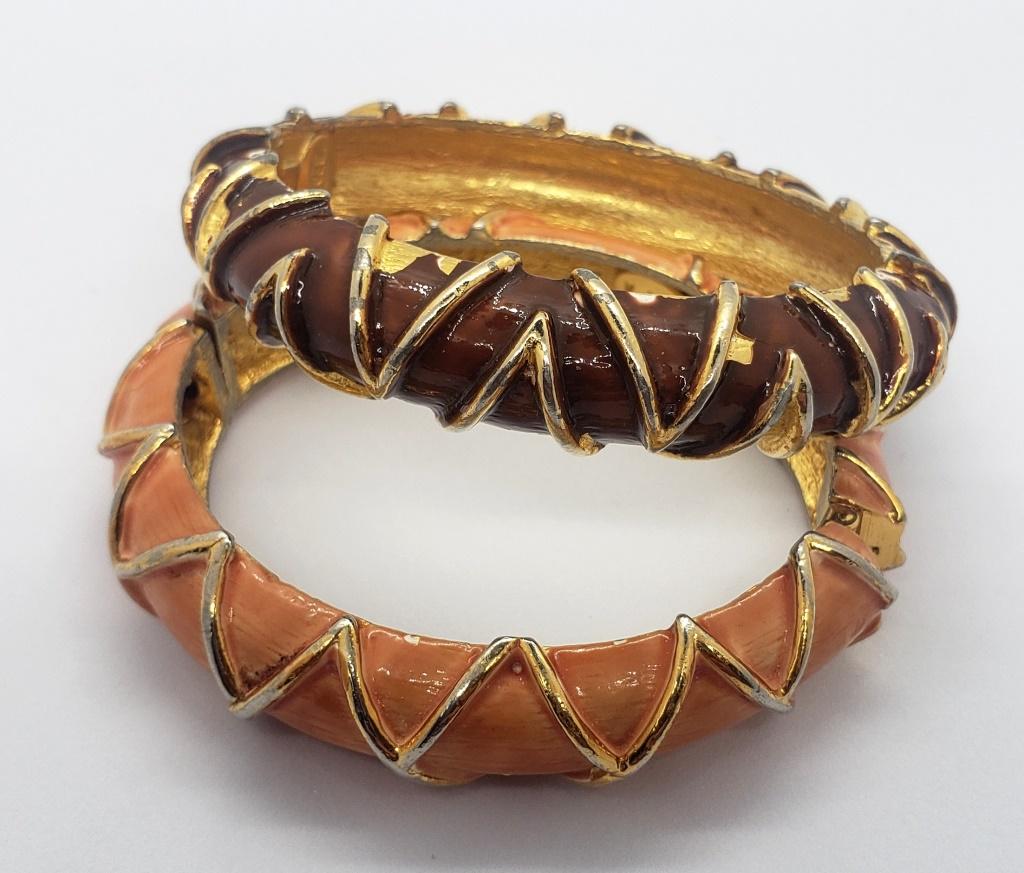 2-VINTAGE KJL SINGED HINGED BANGLES WITH: ENAMEL (1)BROWN ENAMEL & (1)WITH ORANGE