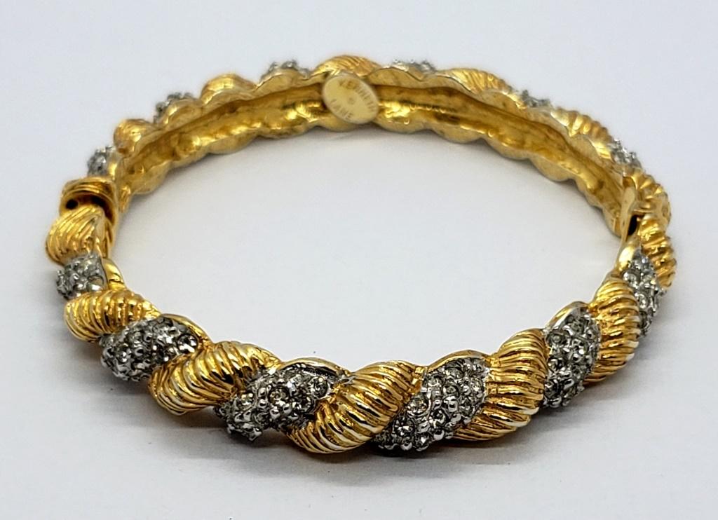 VINTAGE GOLD TONED KJL SINGED HINGED BANGLE (1 of 3)