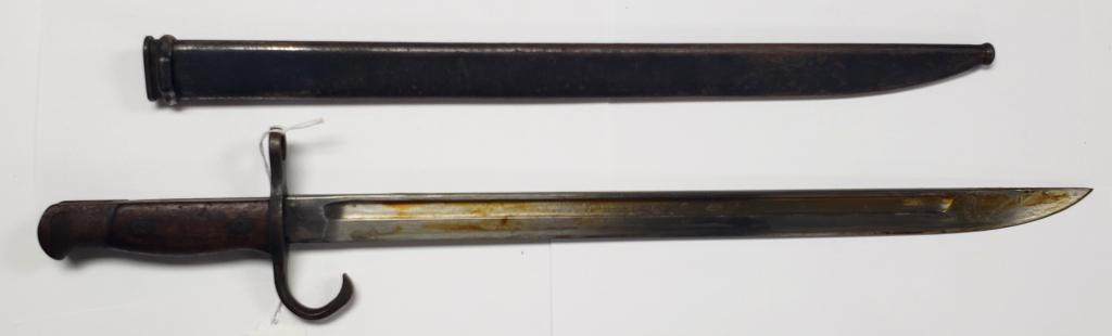 WWII Japanese Arasaka Bayonet W/Scabbard: Some very old oil on the blade that needs cleaned and redone if desired.