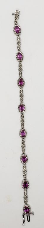 LOOKS NEW! 7 INCH TENNIS STYLE 925 BRACELET: WITH PINK STONE ACCENTS. TOTAL 6.6 DWT