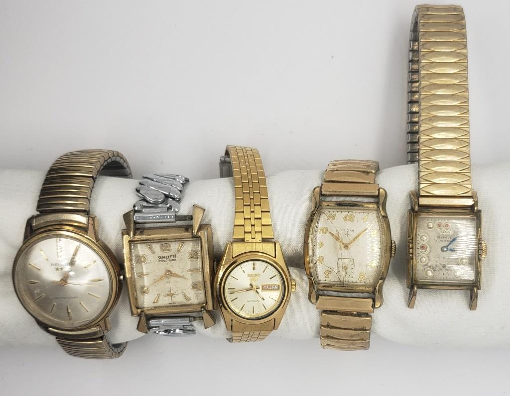 5-MENS VINTAGE WRIST WATCHES: RIMA, BENRUS (RUNS), ELGIN (CRYSTAL CRACKED), SEIKO (RUNS) NICE WATCH, GRUEN ( NOT ORG BAND) - (NOT RUNNING UNLESS MENTIONED- NO MISSING PARTS UNLESS MENTIONED)