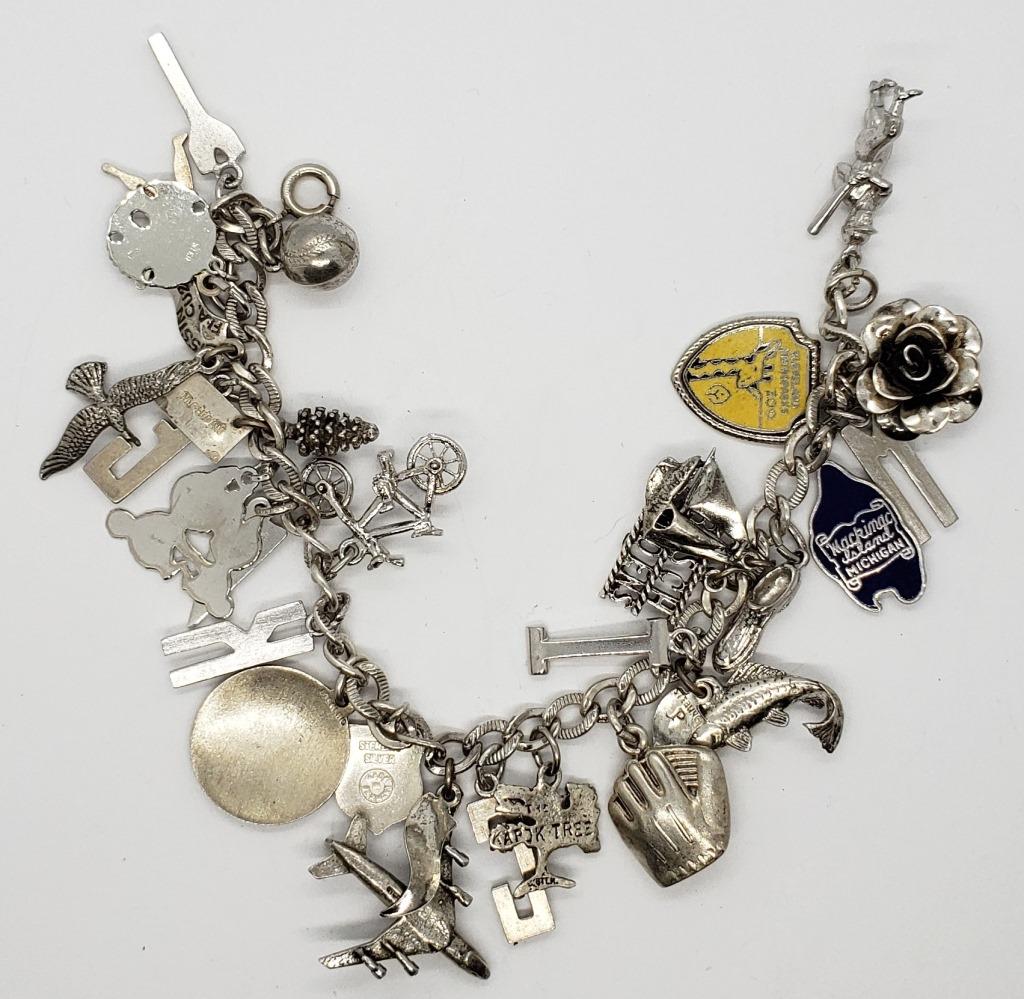 STERLING CHARM BRACELET w/26 CHARMS: 25 MARKED STERLING - GREAT MIX (1) MICKEY MANTLE - BRACELET STERLING (35.5 DWT)